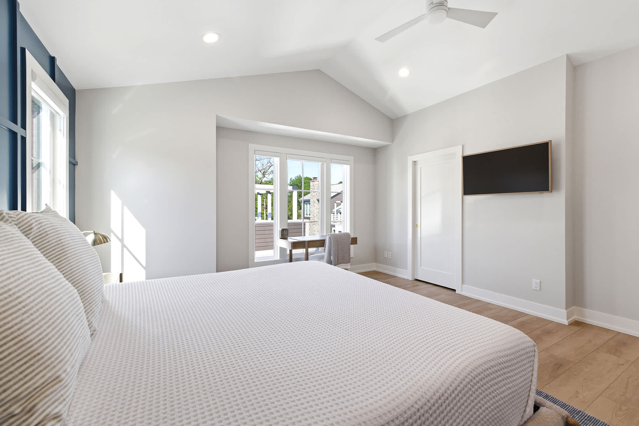 Primary bedroom is on the 3rd level and has a king-sized bed.