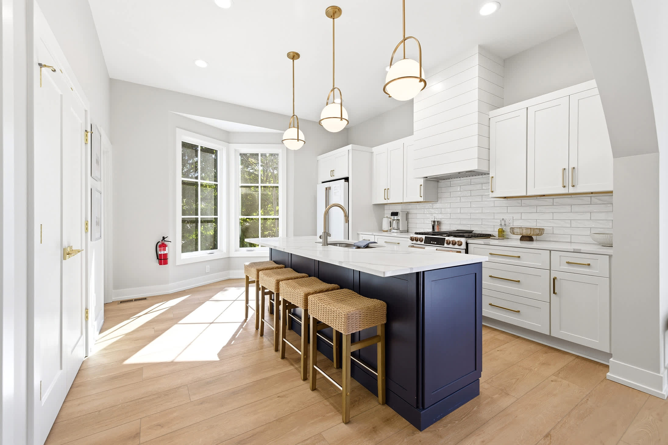 Large island creates room for cooking, dining, and connection.