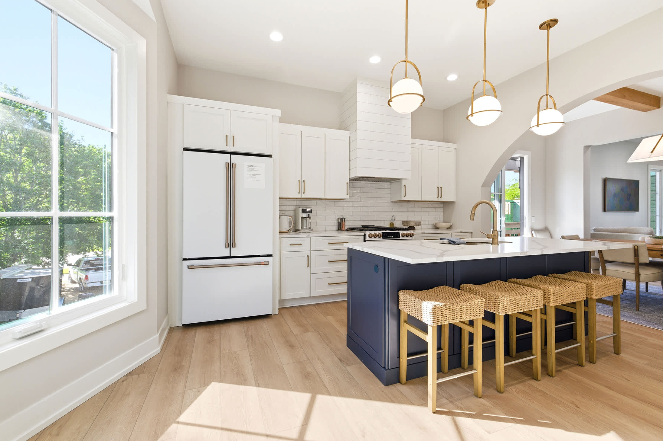 Open kitchen, oversized island. Union Pier rental built for group cooking.