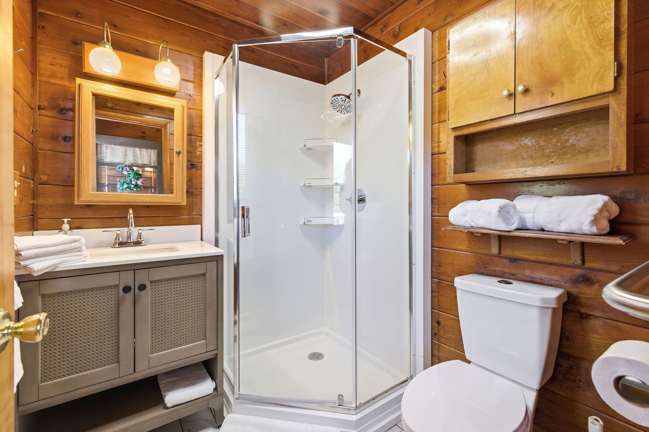 Full bathroom with a walk-in shower for easy daily routines.
