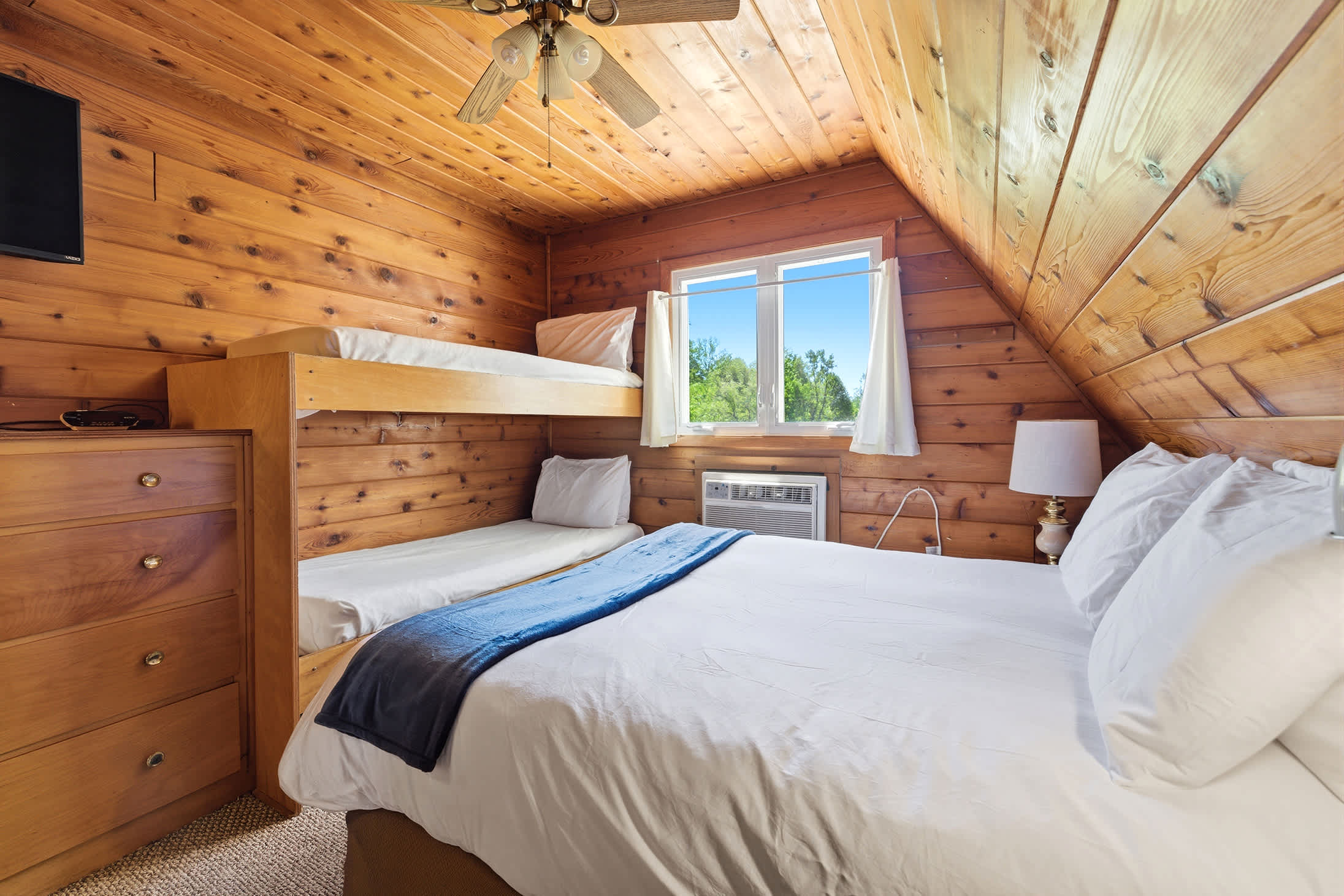 Dedicated bedroom with space for both adults and younger guests.