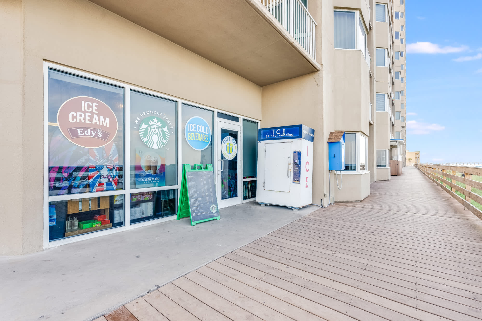 Tidewater 200 – Exterior view of Tidewater 200 featuring vending machines and nearby boardwalk.