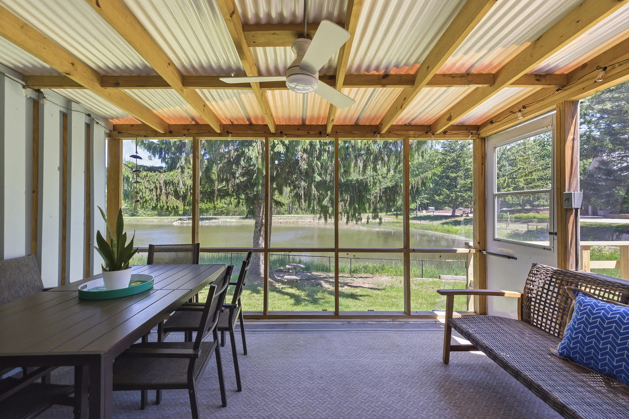 Enjoy outdoor dining with pond views and room for the whole family.