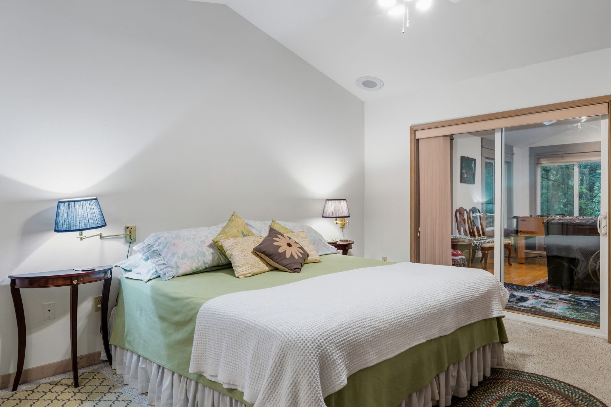 Enjoy the convenience of a private main-level retreat featuring a king bed and en-suite bathroom, Smart TV, Ceiling fan and easy access from the main living area