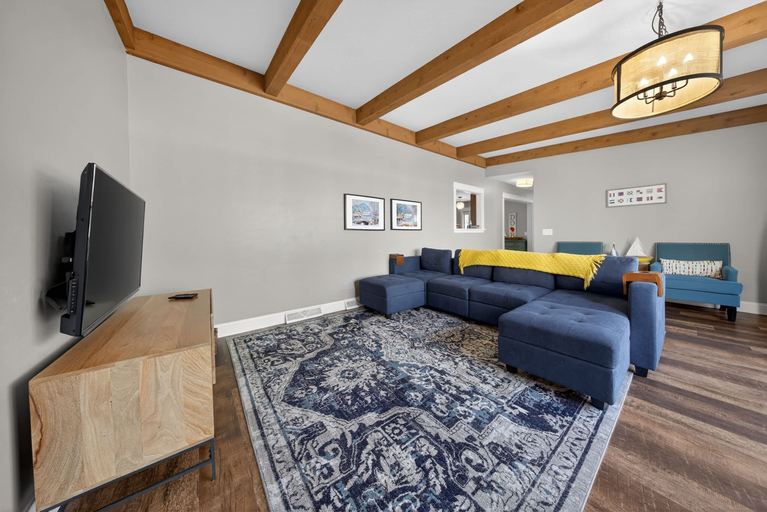 Large couch and tv in living room