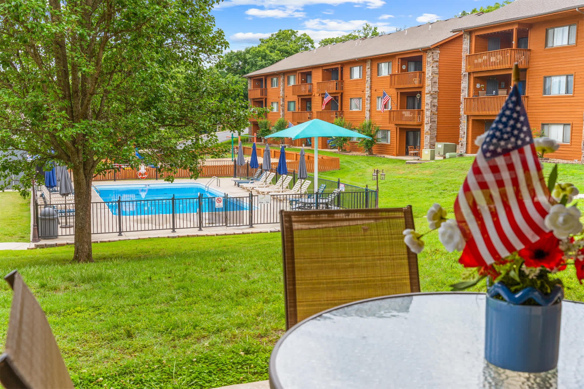 Lounge the day away or dine alfresco with serene pool views on the patio​