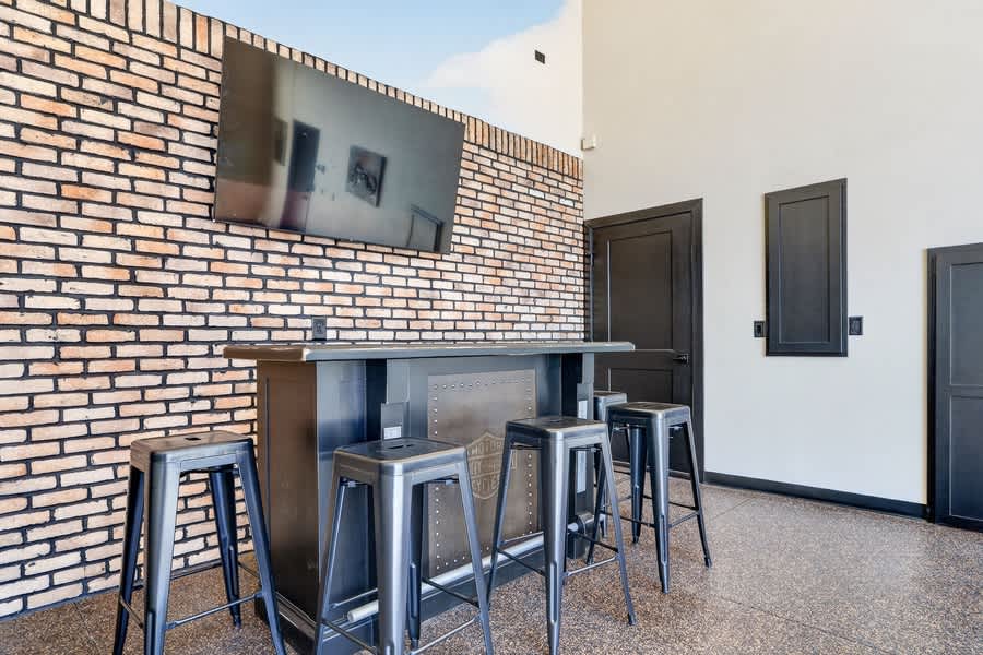 The huge garage also has bar top and TV perfect for hanging out after a long day on the water!