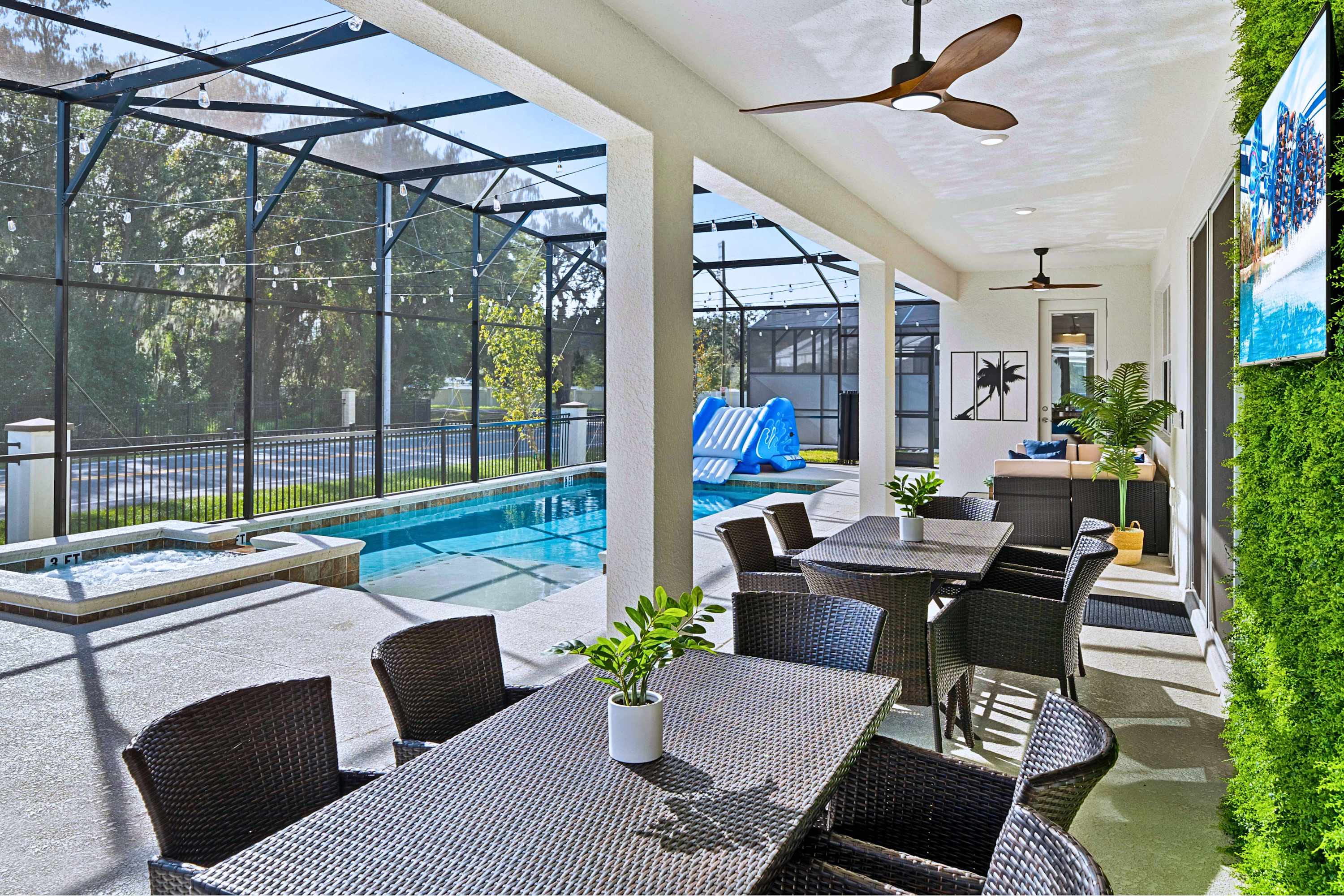 Poolside Dining Area with Wall Mounted TVs
