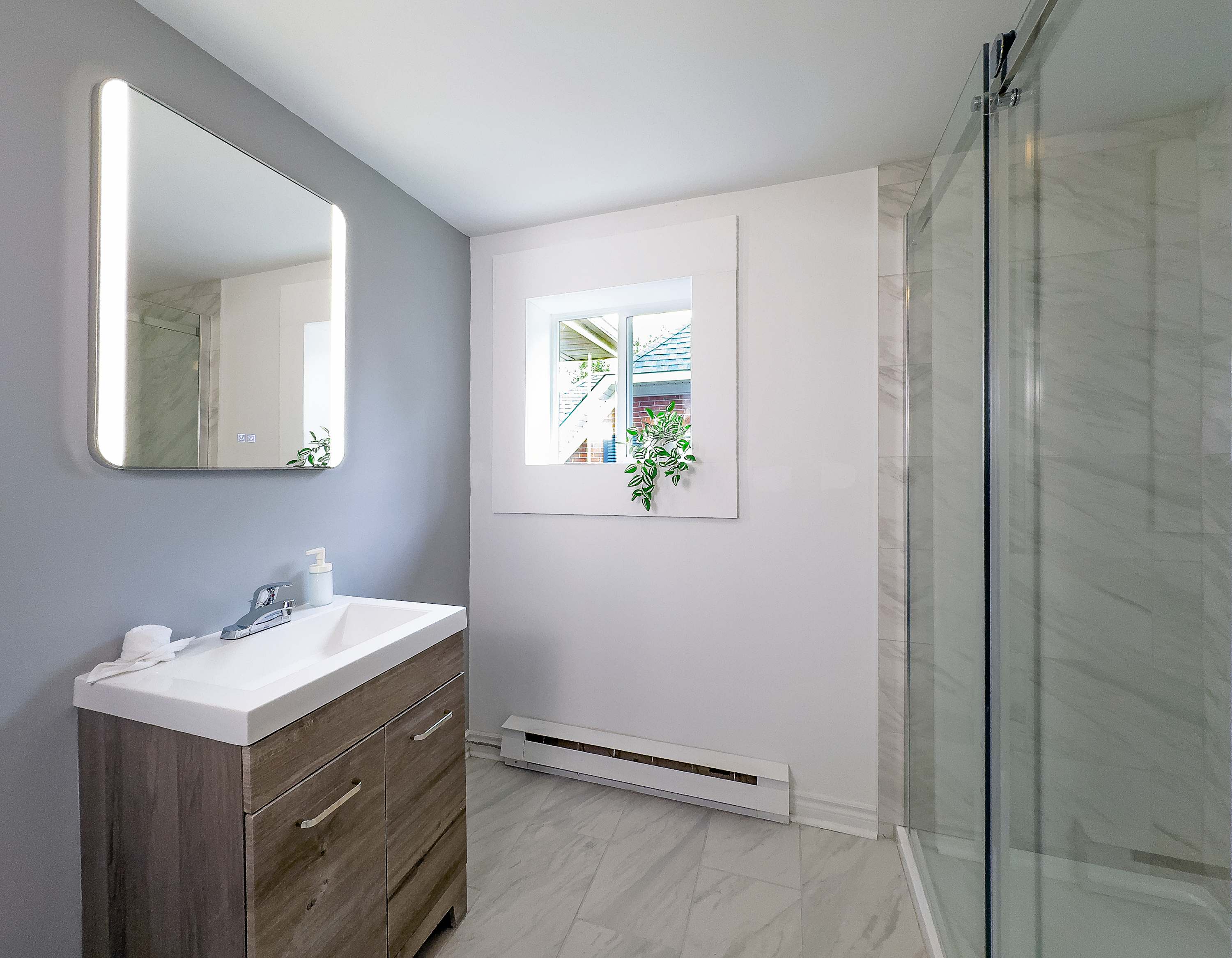 Large standing shower in the modern bathroom