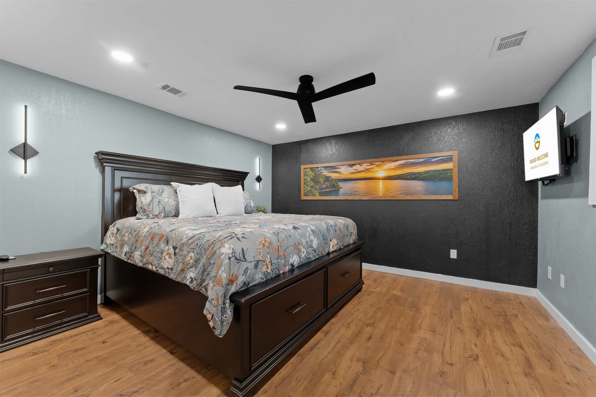 Recharge in the bedroom retreat, offering a stately king bed & smart TV​