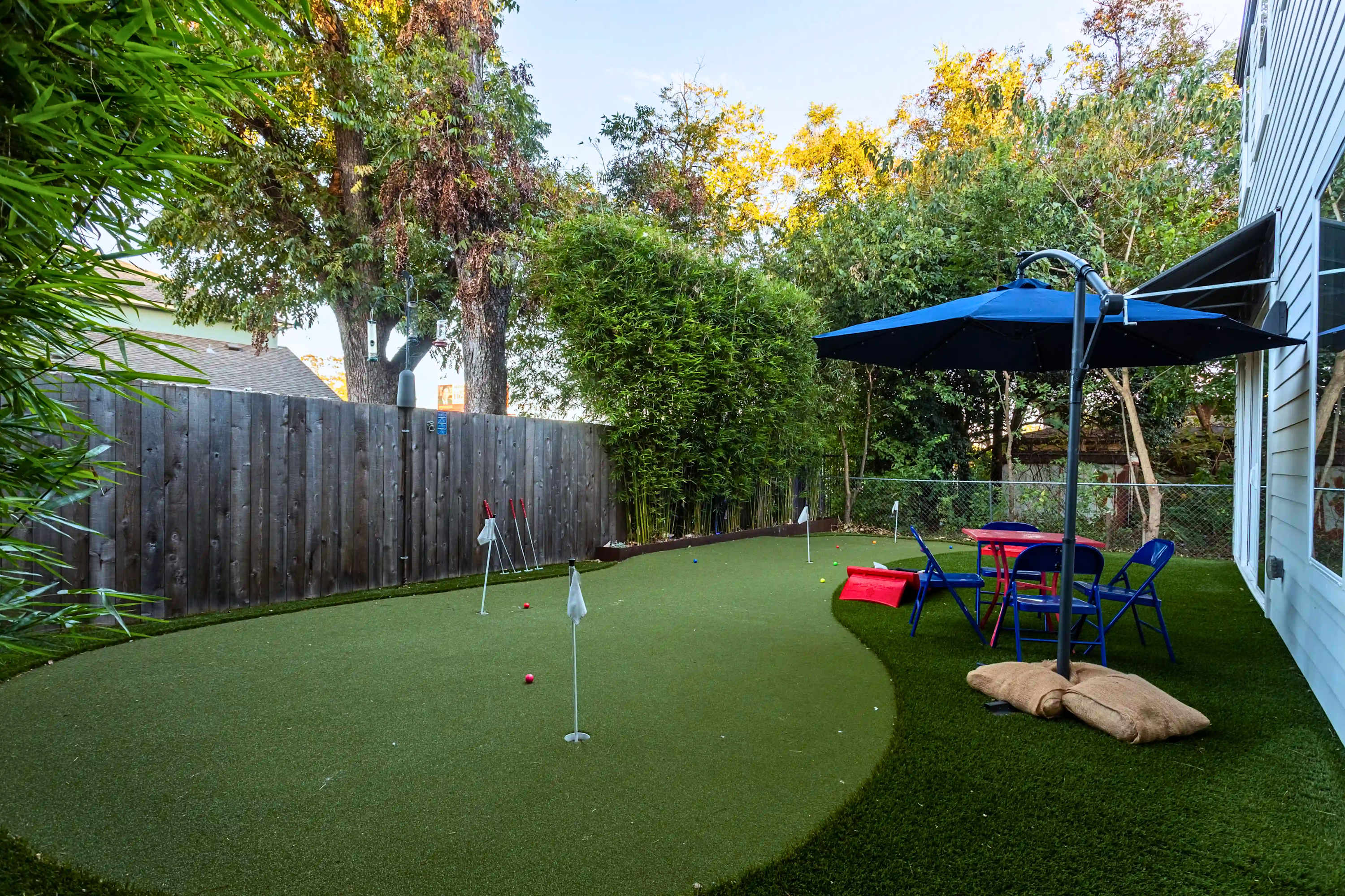 Private Mini Golf and Covered Fireplace Lounge 6