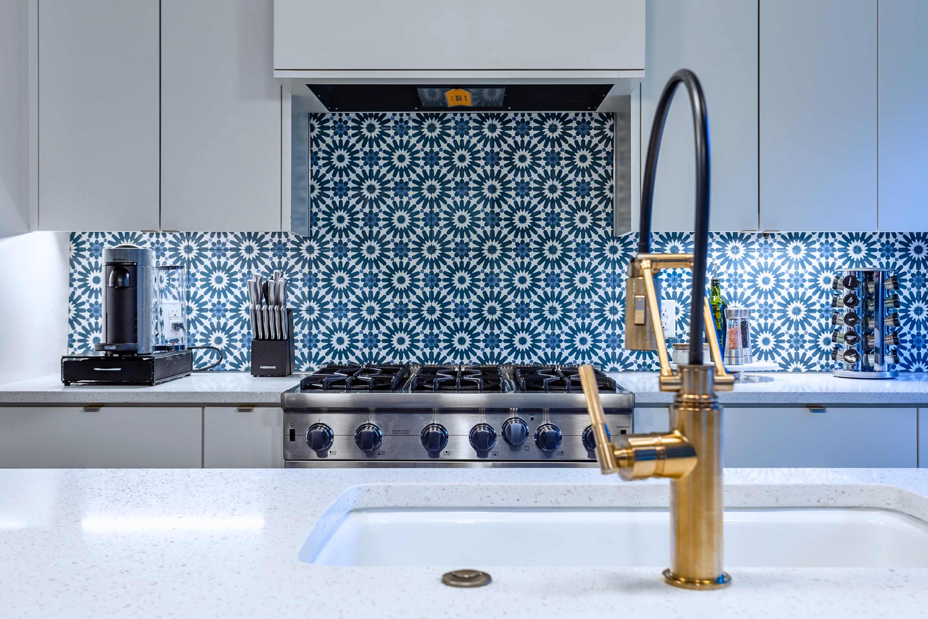 Well designed kitchen with stove and oven, making cooking simple, efficient, and enjoyable in a fully equipped space