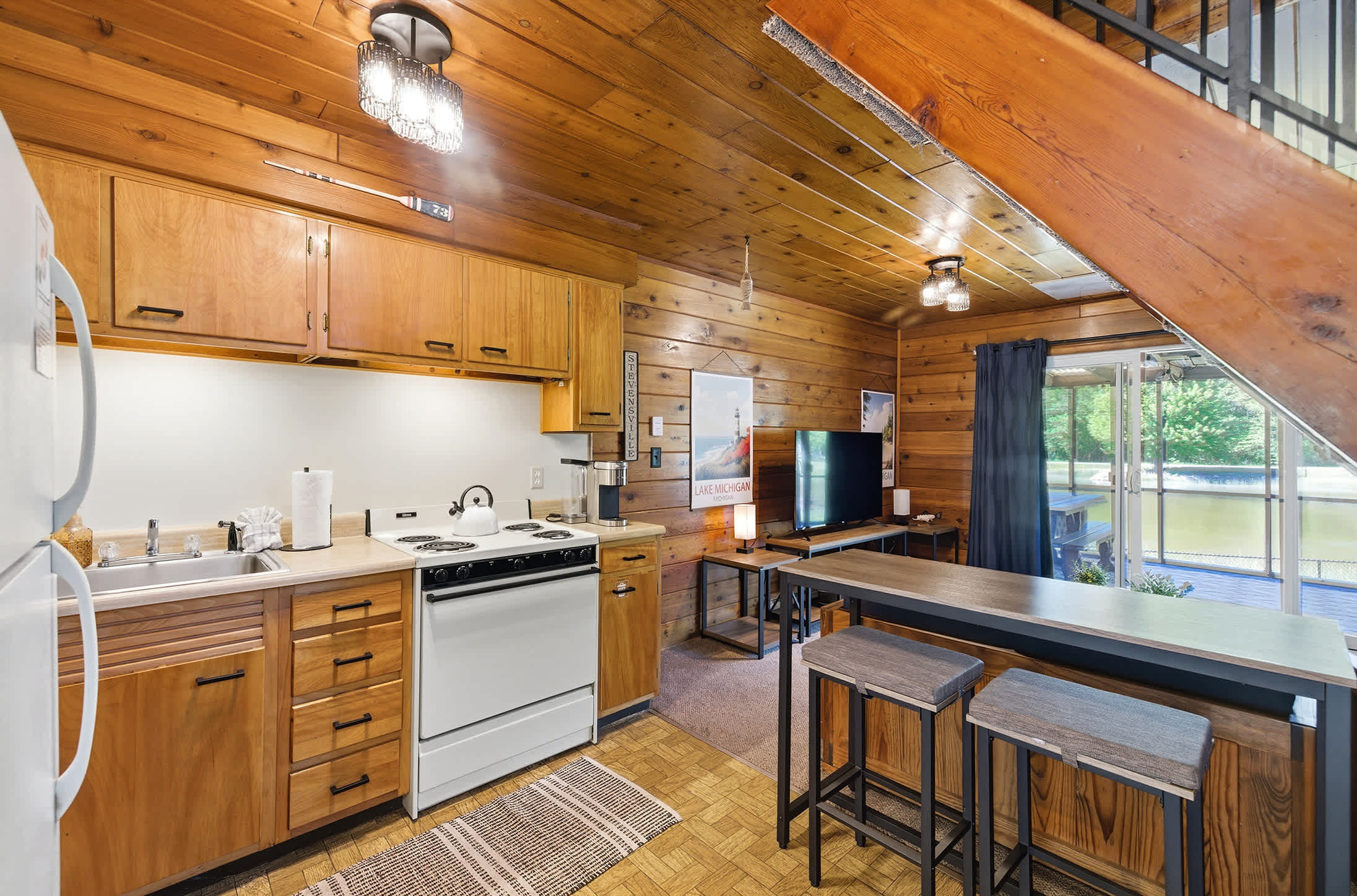 Open concept kitchen and seating area for convenient vacation living.