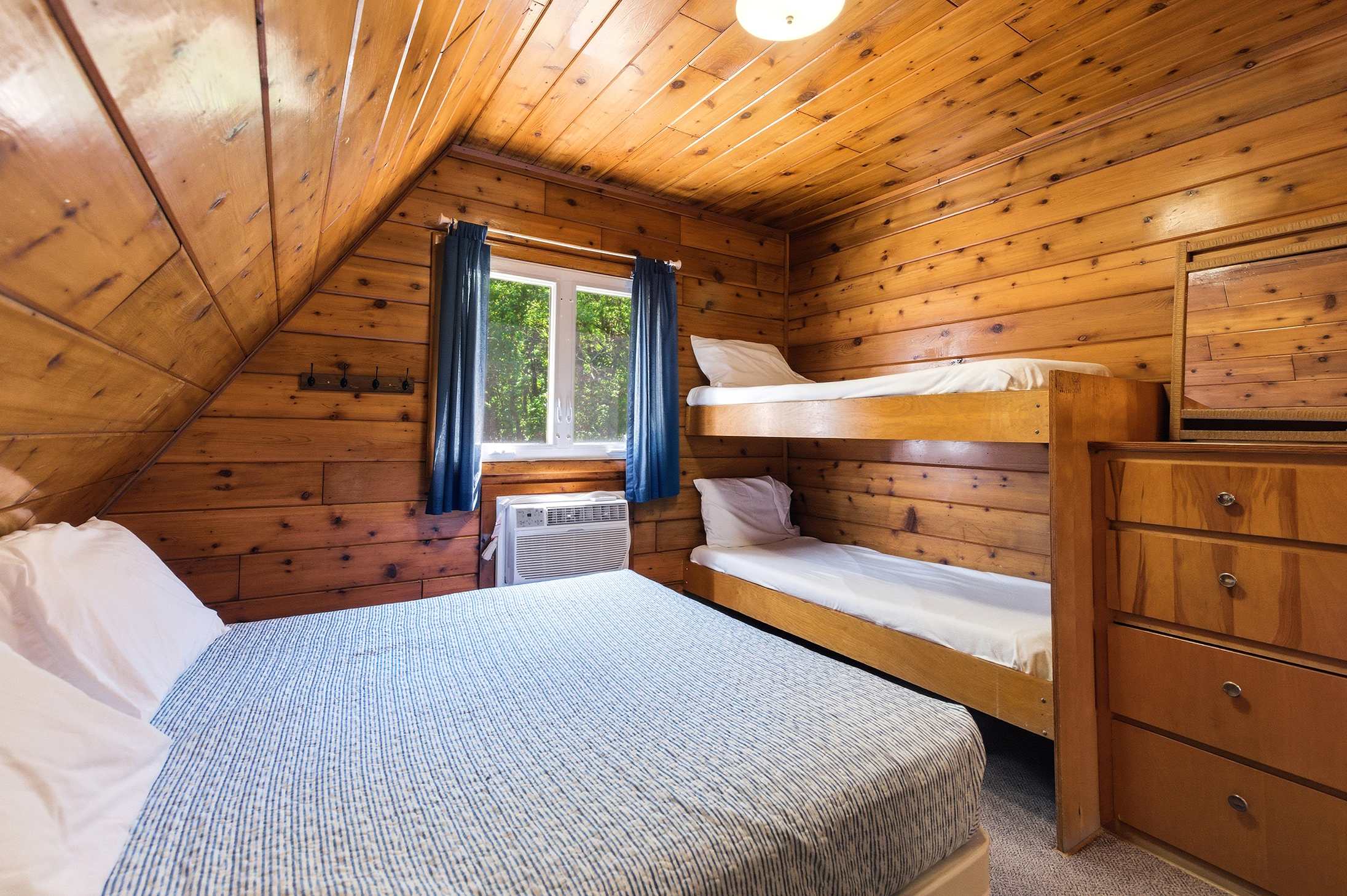 Bedroom 2 is on the 2nd level and has a queen and a single bunk bed.