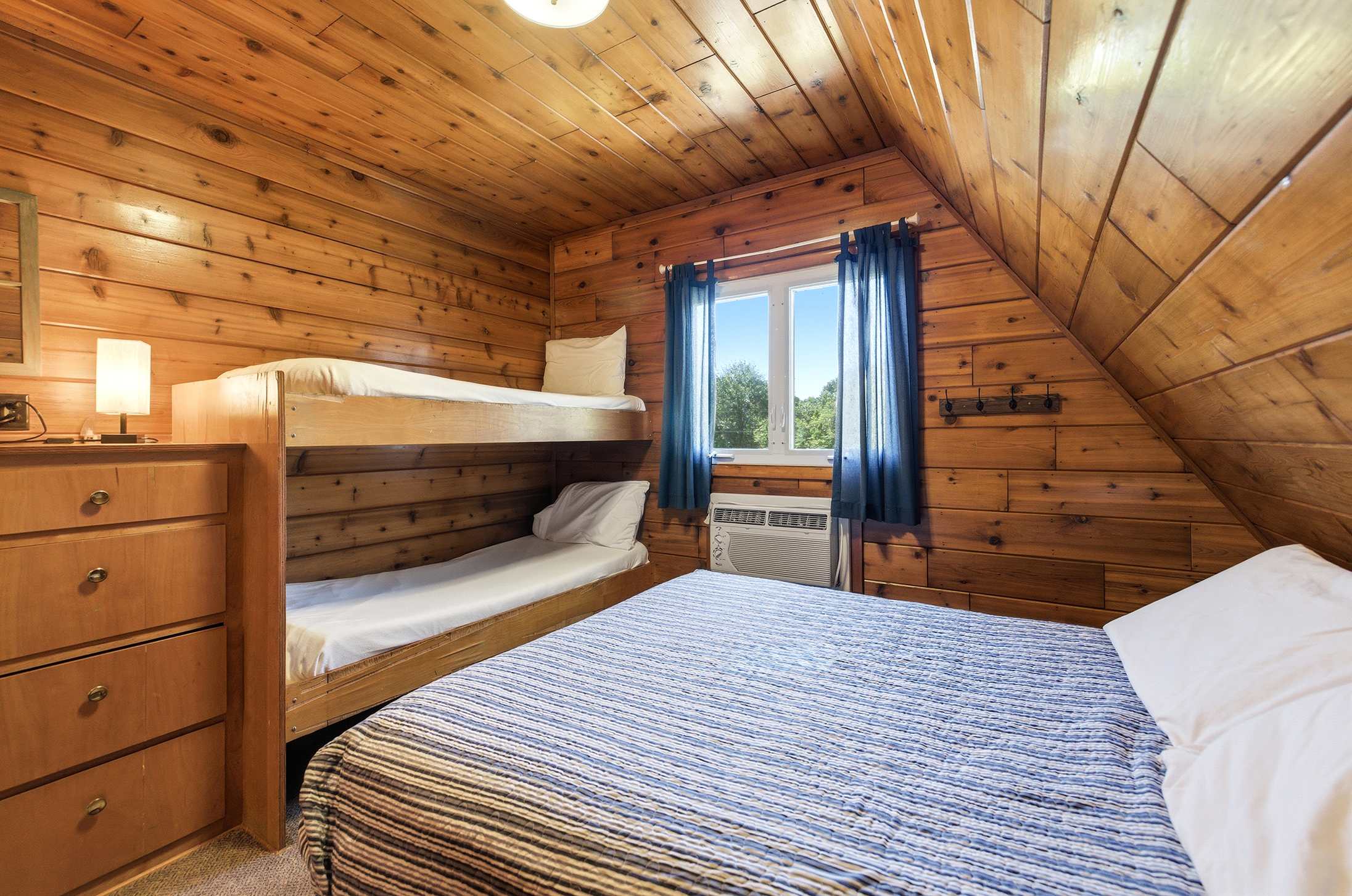Bedroom 1 is on the 2nd level and has a queen and a single bunk bed.