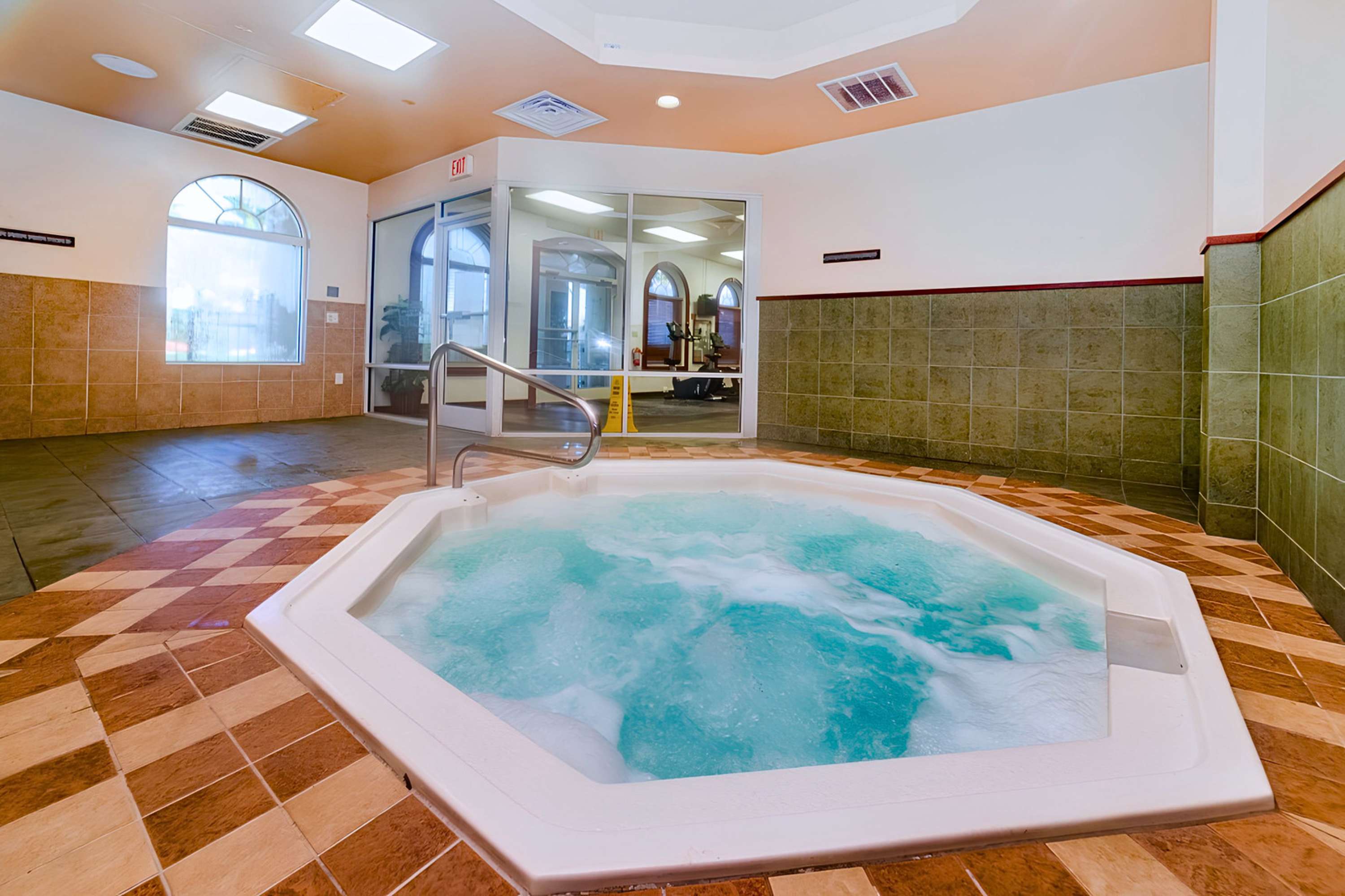 Soak in the heated jacuzzi and ease into full vacation mode