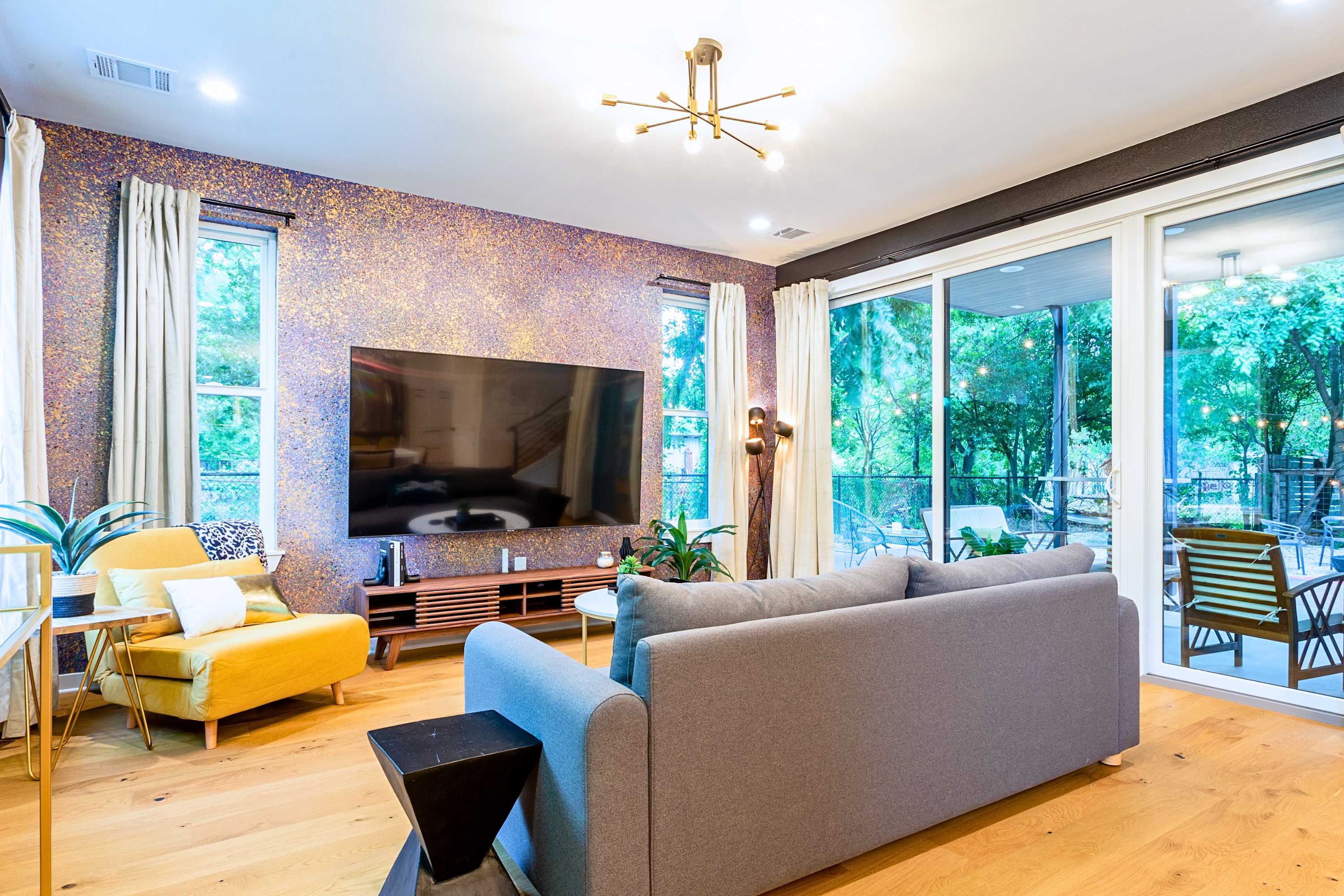 Living Room With A Smart TV And Stylish Decor