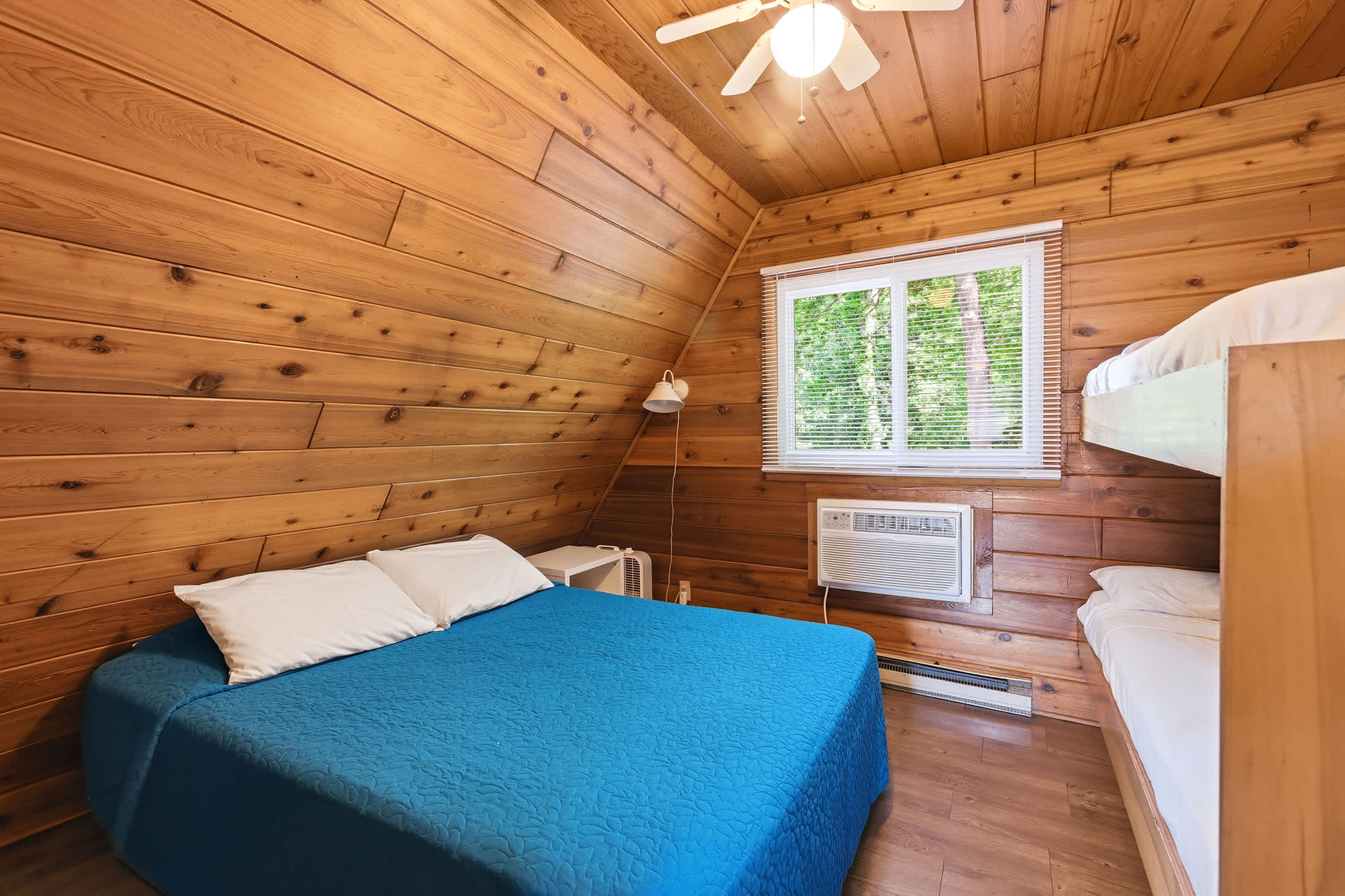 Bedroom 2 is on the 2nd floor and has a queen and single bunk bed.