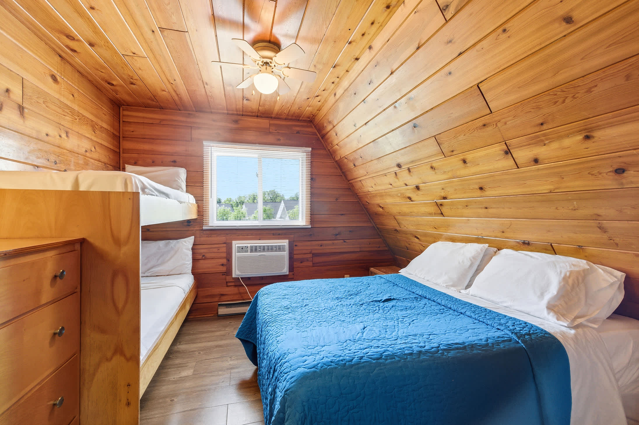 Bedroom 1 is on the 2nd floor and has a queen and single bunk bed.