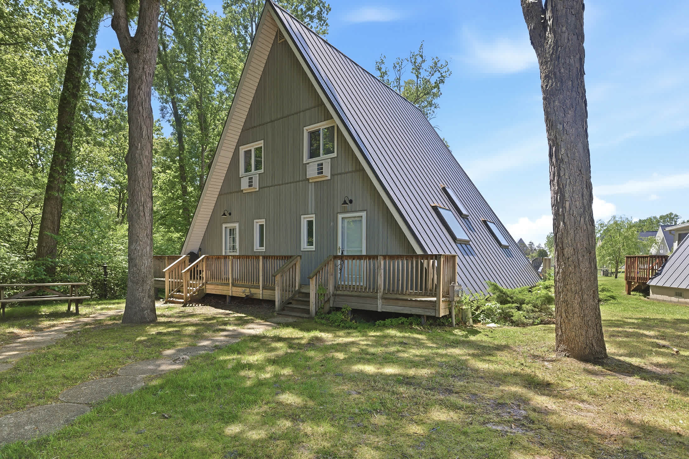 Chalet #71 is just steps from recreation areas, with outdoor space for downtime.