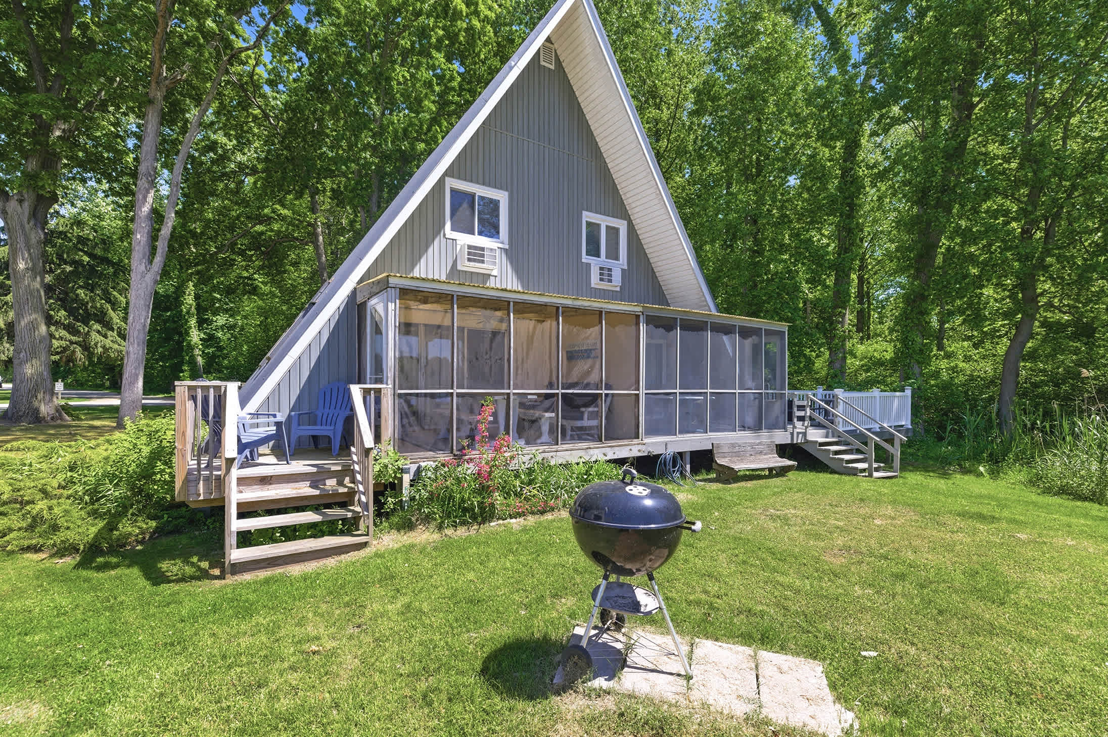 Chalet #71 is near the sports courts and playground, with room to grill and unwind.