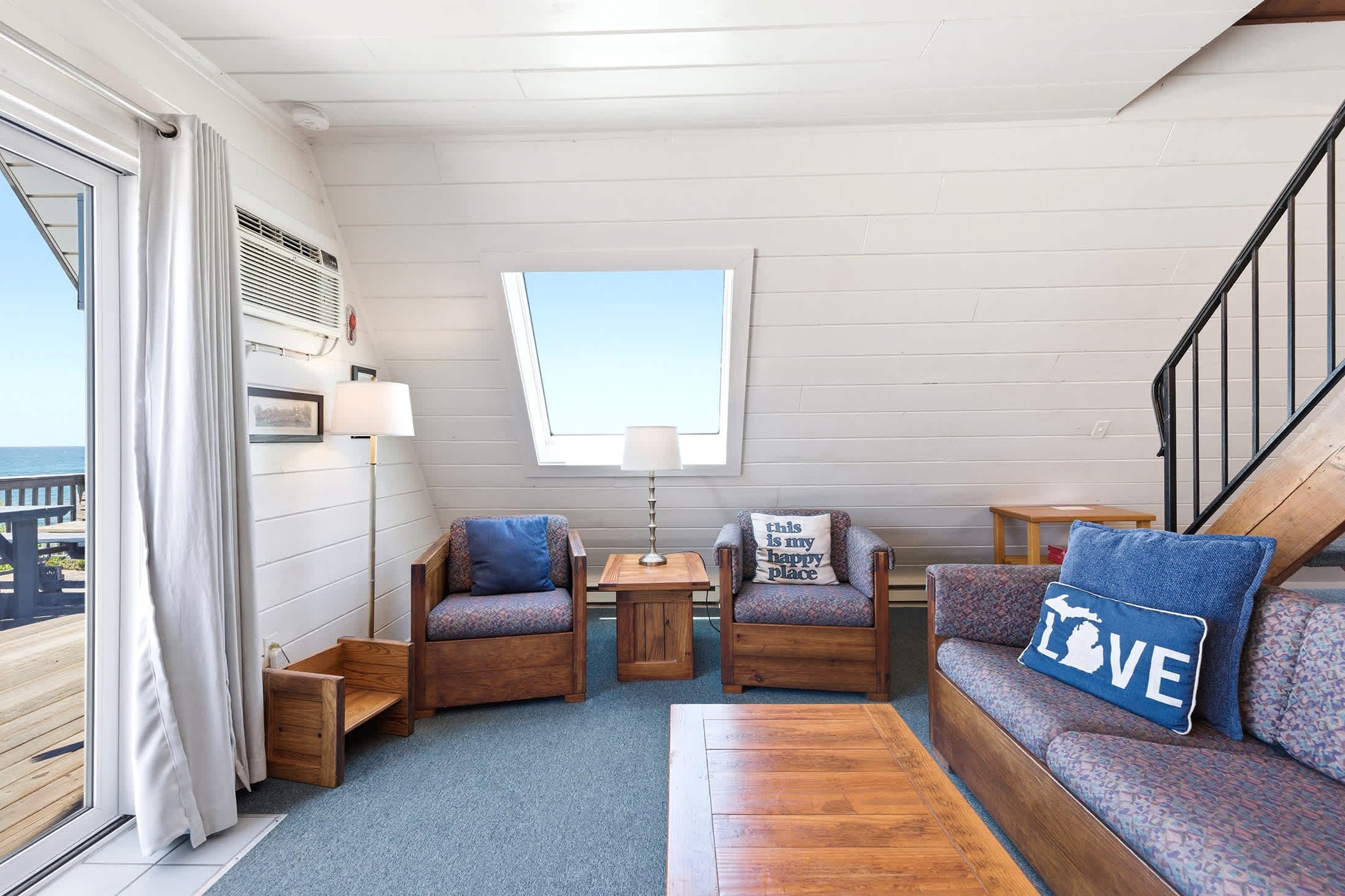 Gather with Lake Michigan views just beyond the deck doors.