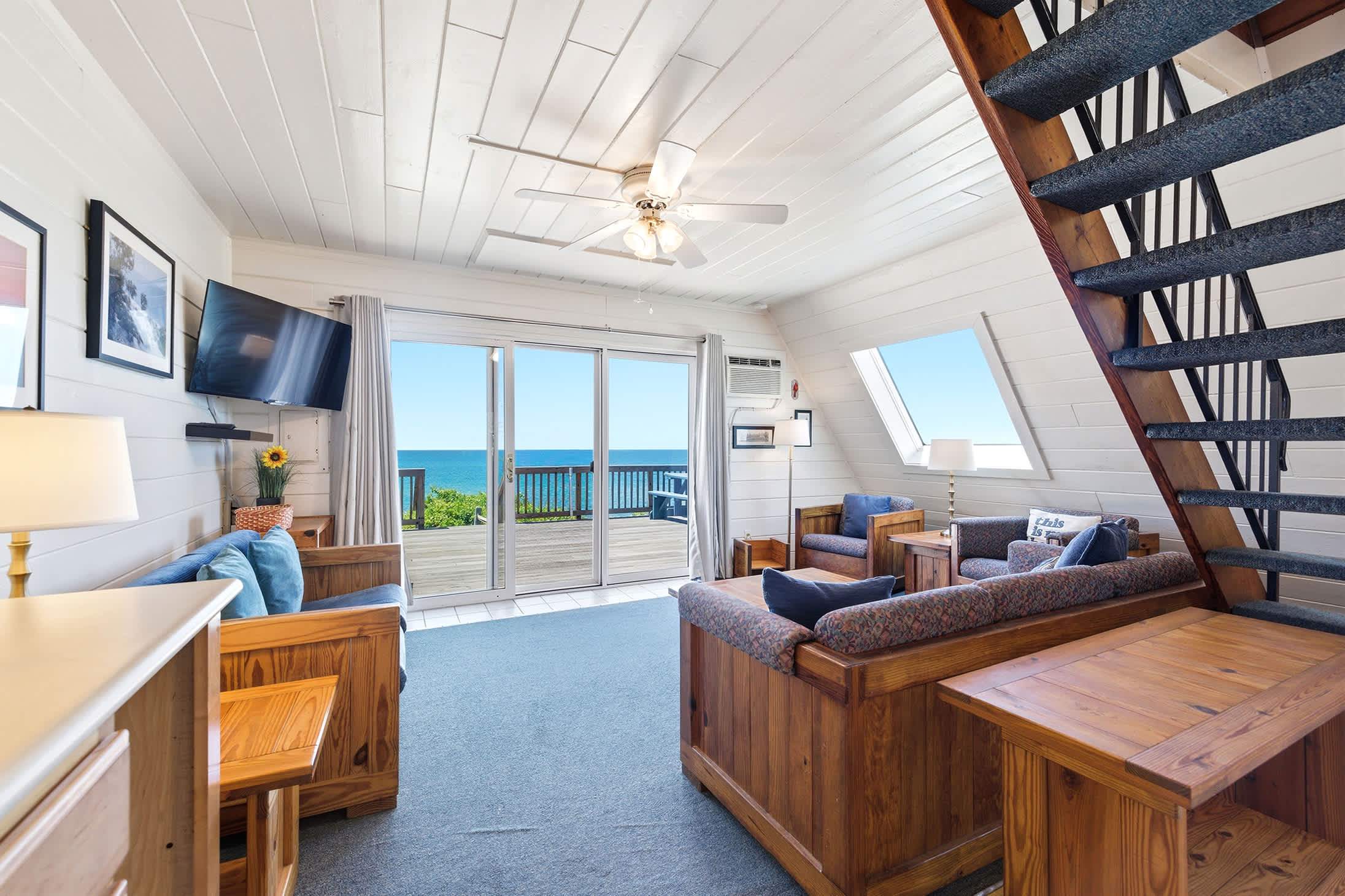 Chalet #20's Lakeside living with direct access to the deck and shoreline views.