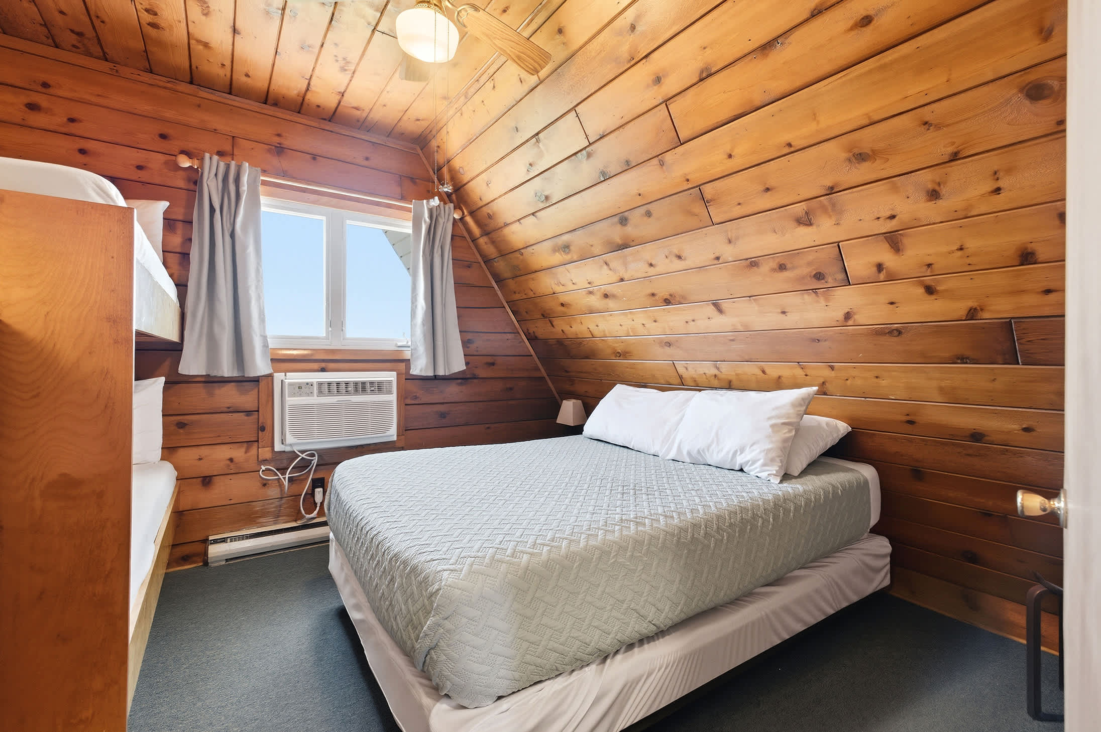 Bedroom 1 is on the 2nd floor and has a queen and single bunk bed.