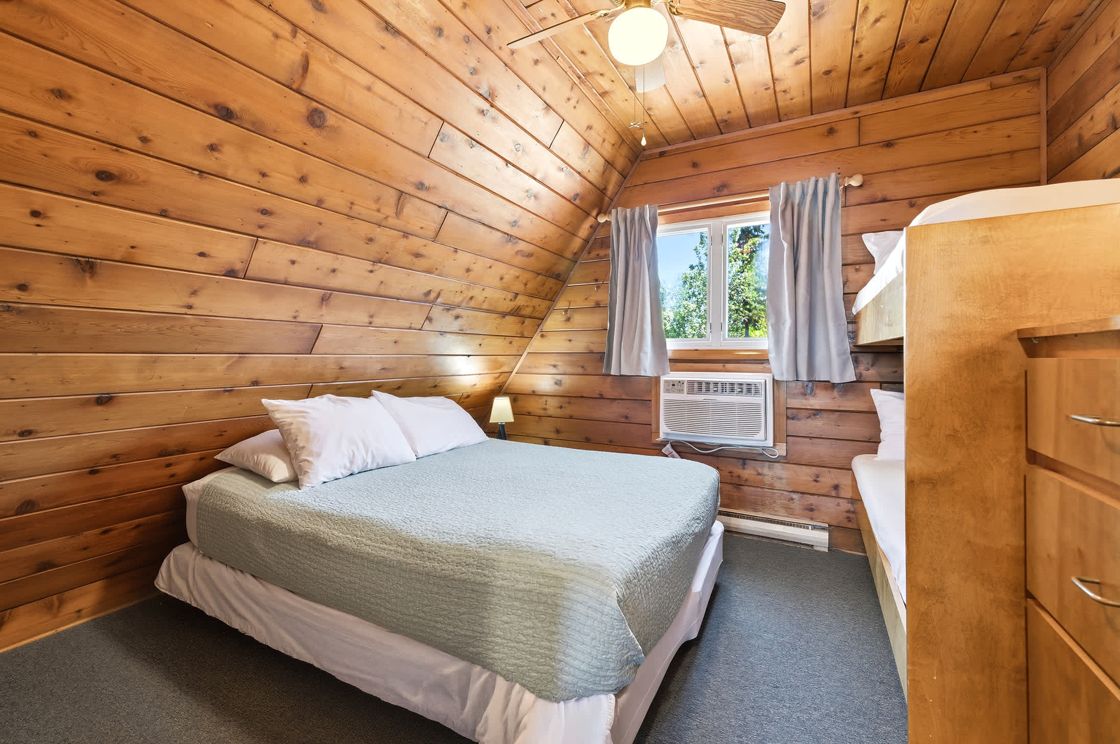Bedroom 2 is on the 2nd floor and has a queen and single bunk bed.