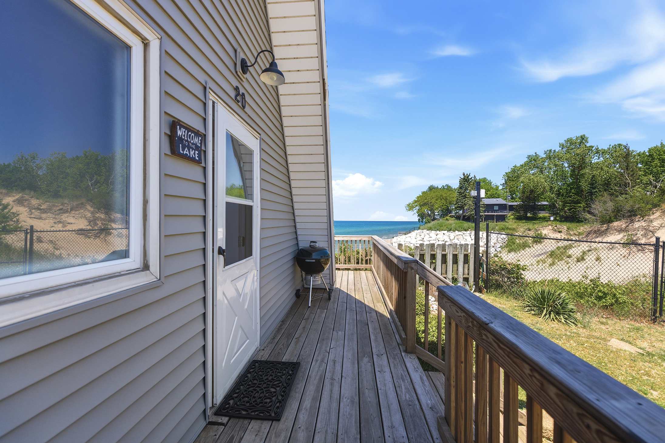 BBQ grill and beach access begin right outside Chalet #20