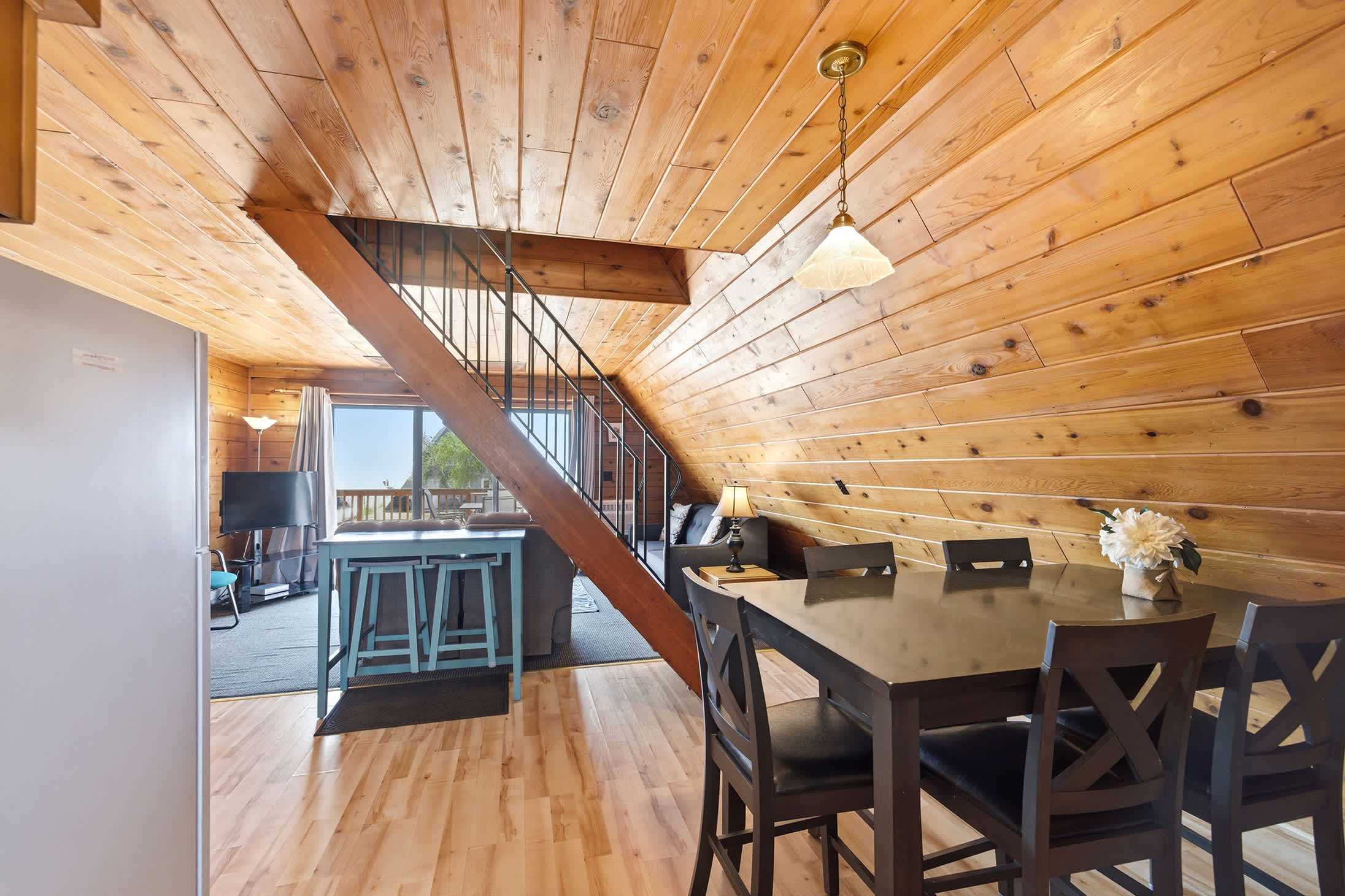Open dining area keeps meals, games, and conversation in one shared space.