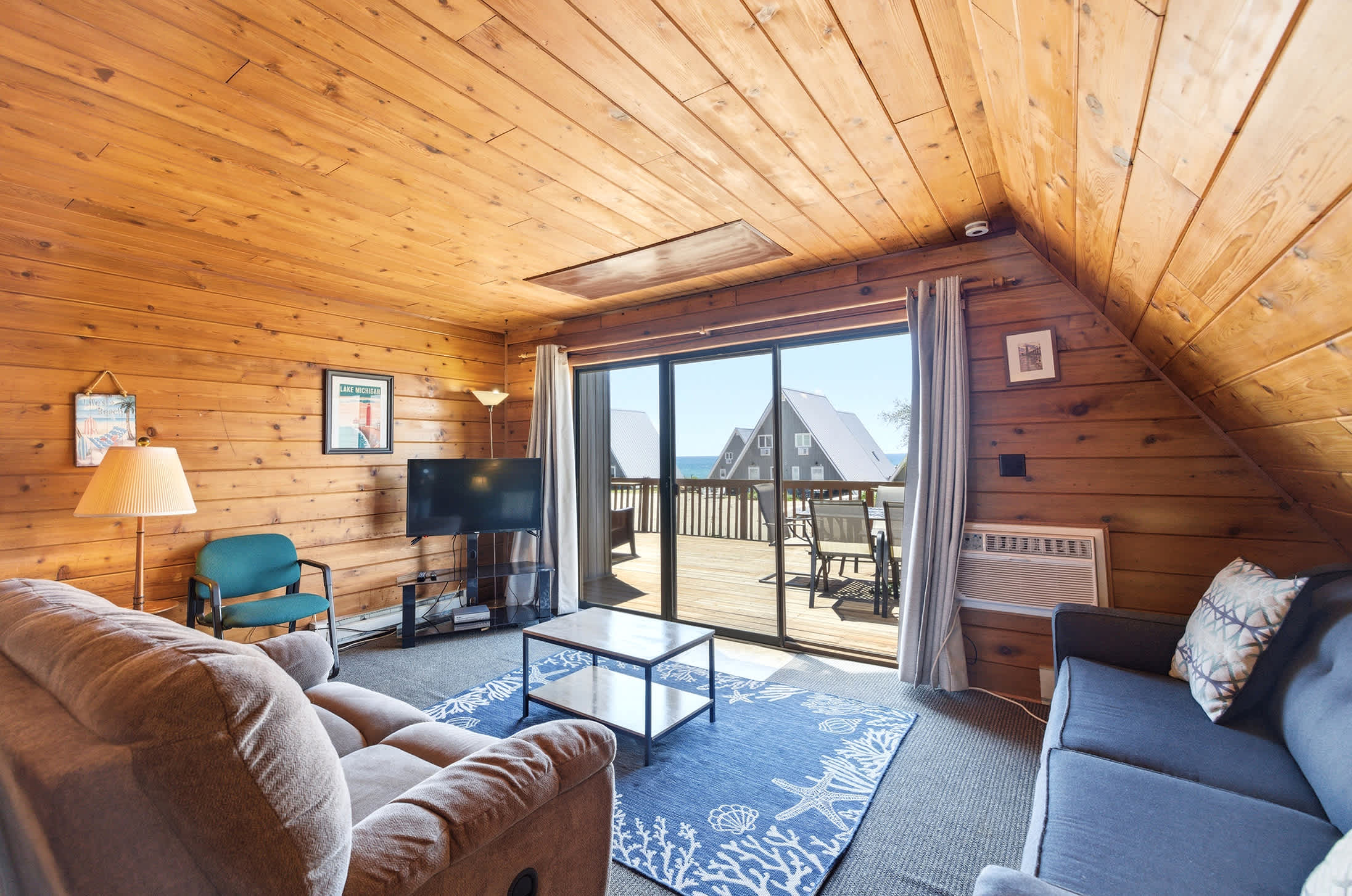 Open living area overlooking Lake Michigan and the resort shoreline.