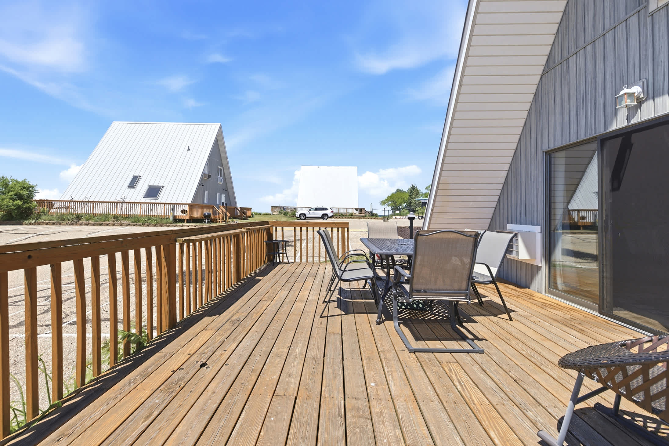 Chalet Om's deck with outdoor dining for easy family meals.