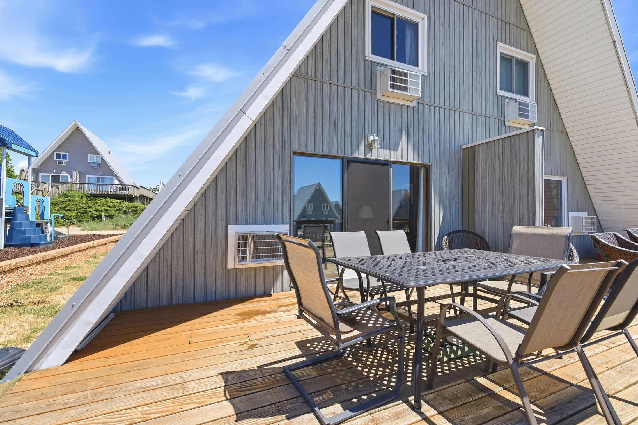 Outdoor dining area near resort amenities makes meals and gatherings convenient.