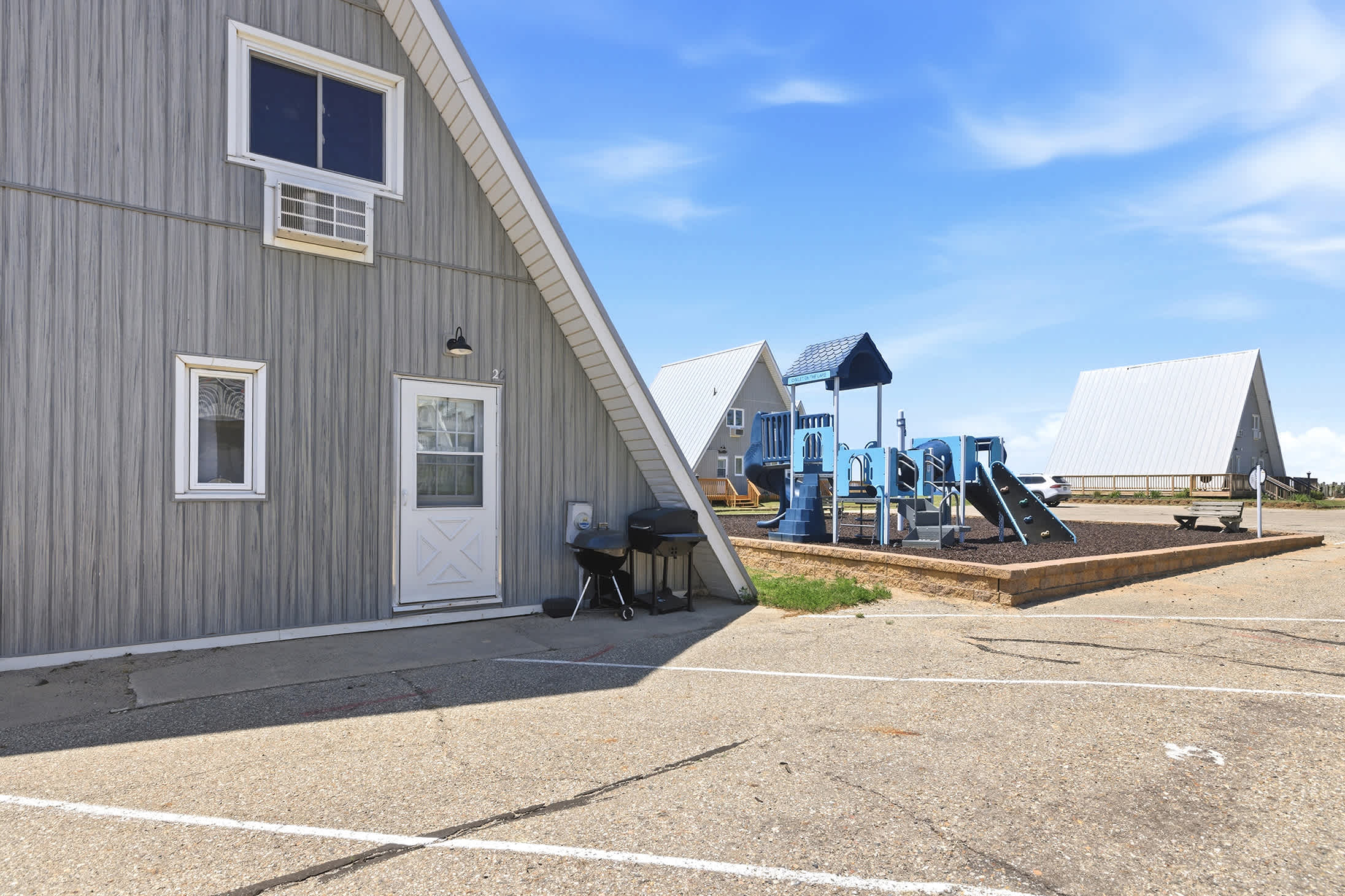 Chalet Om is located beside the playground, making outdoor play easy for families.
