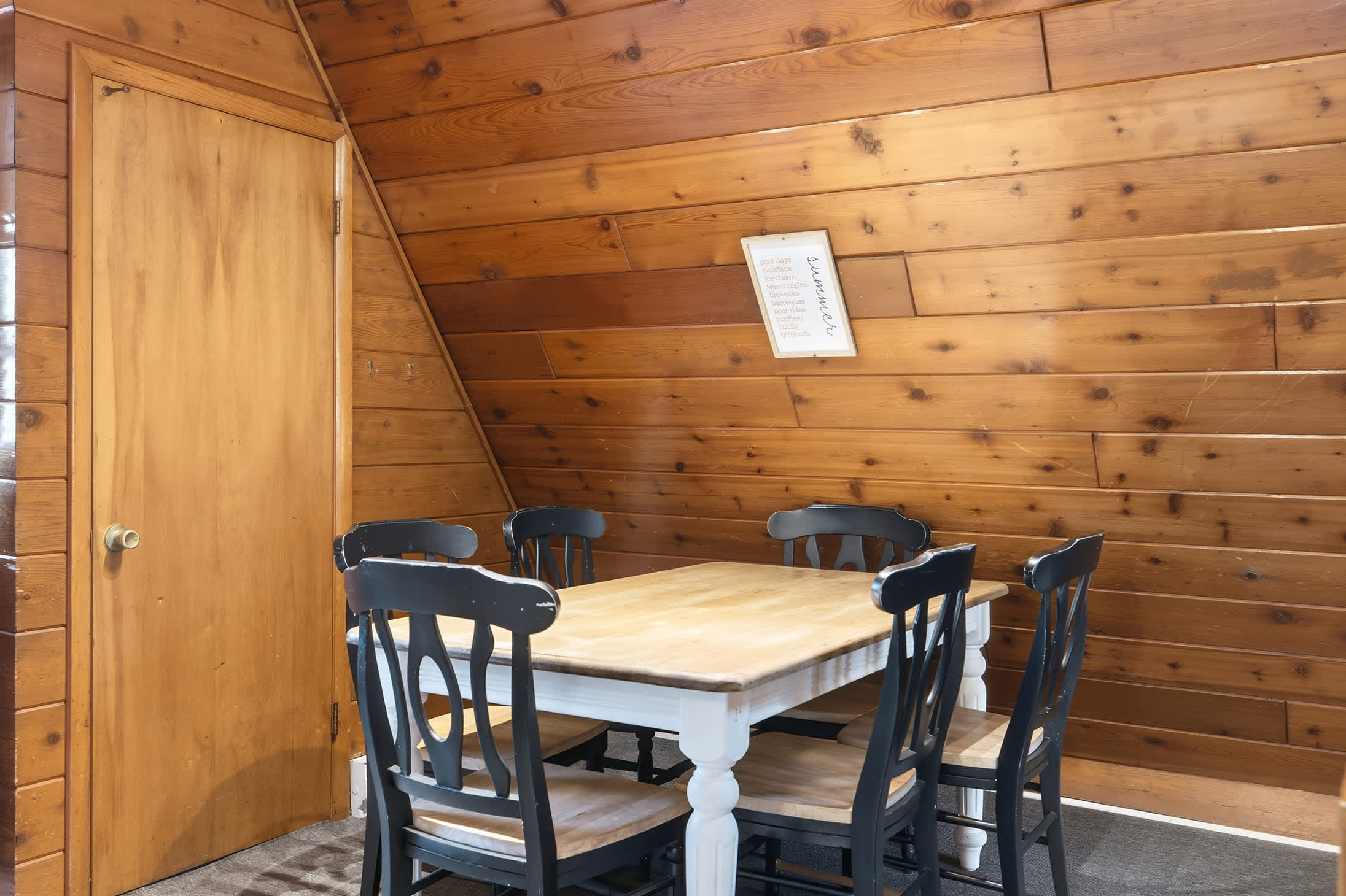 Dining table near the kitchen keeps meals and conversation in one place.