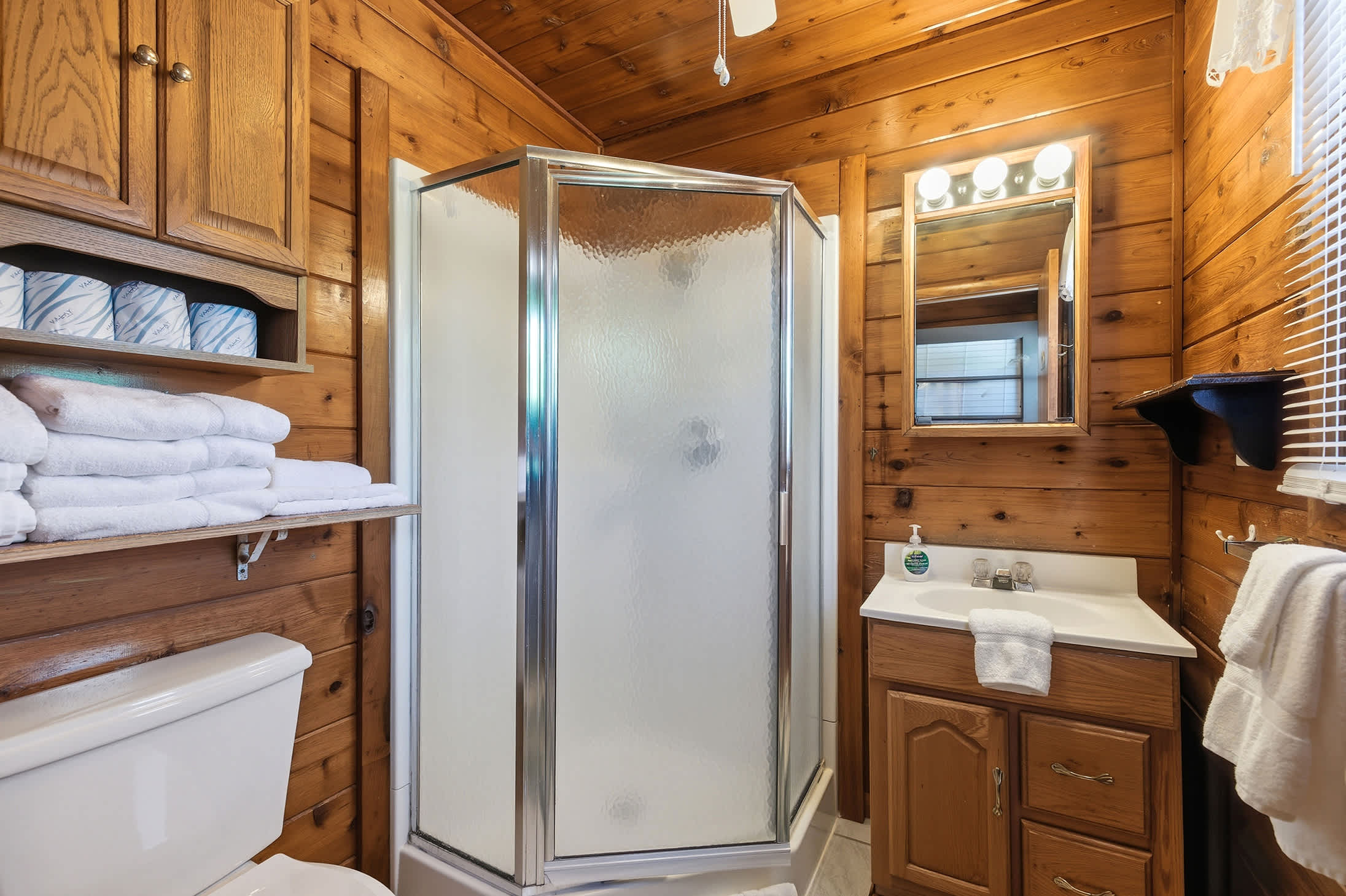 Main bathroom with a walk-in shower offers a convenient space to refresh.