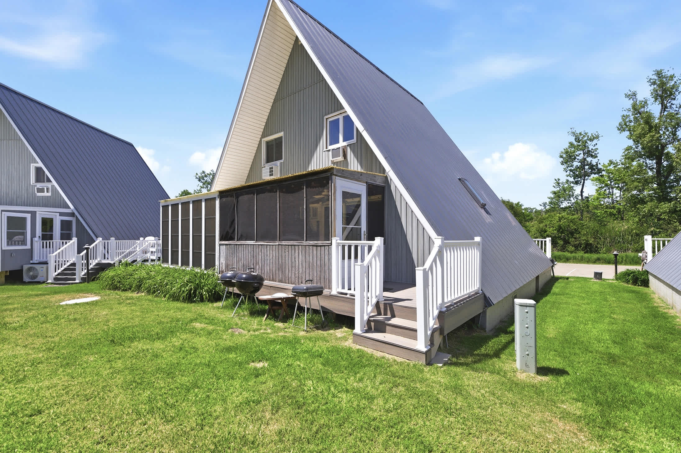 Outdoor grilling and screened dining space add flexibility to your vacation routine.