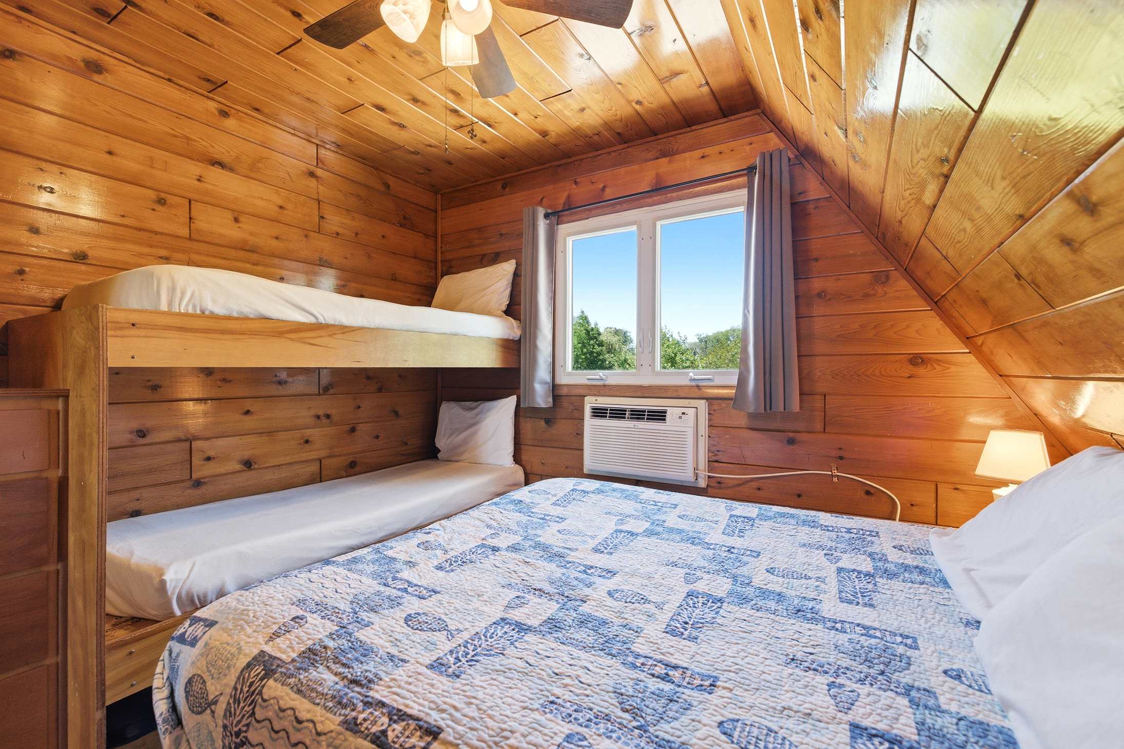 Family-friendly bedroom with bunks adds extra sleeping capacity without sacrificing comfort.