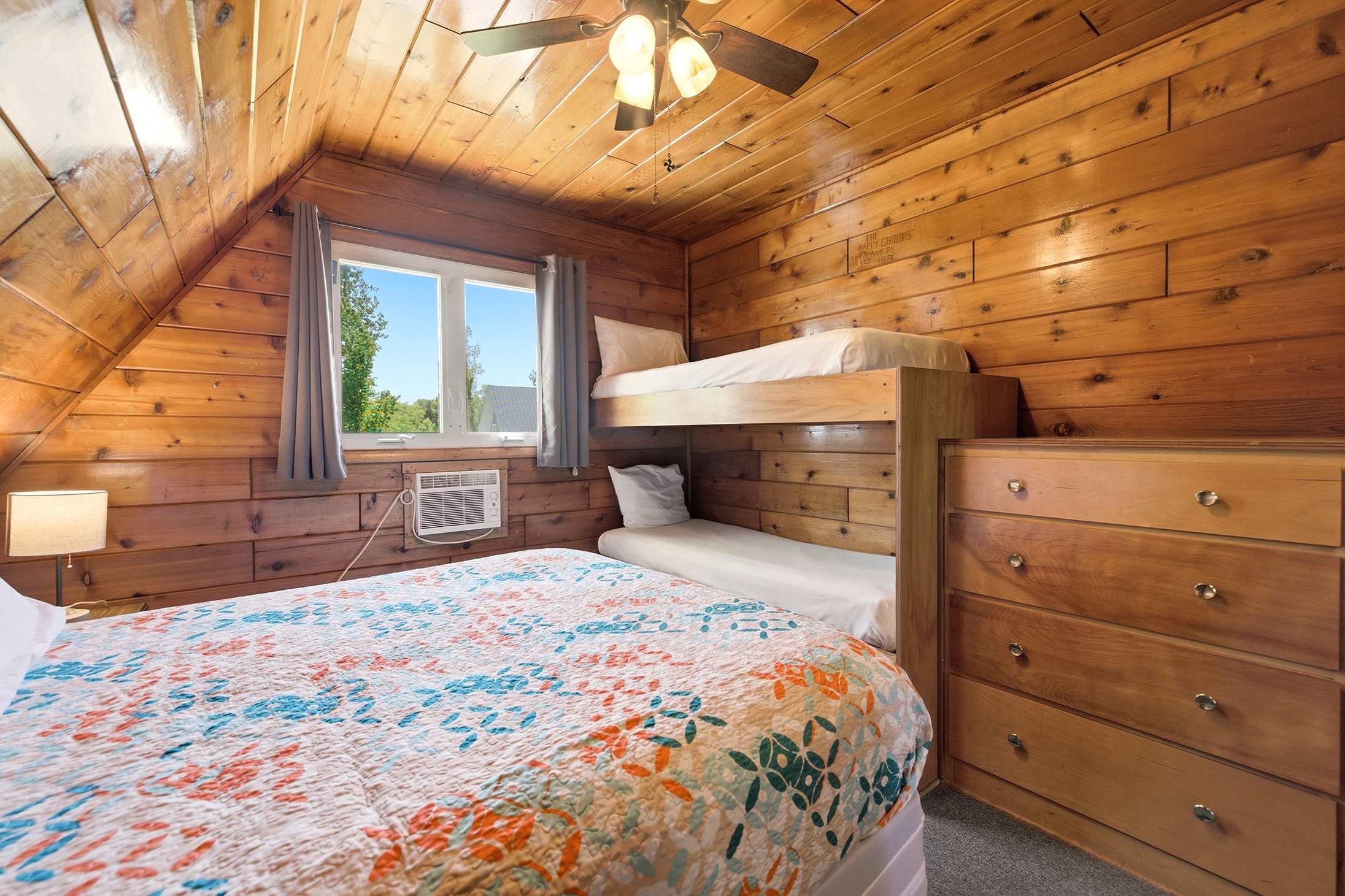 Family bedroom with mixed sleeping options makes group stays more convenient.
