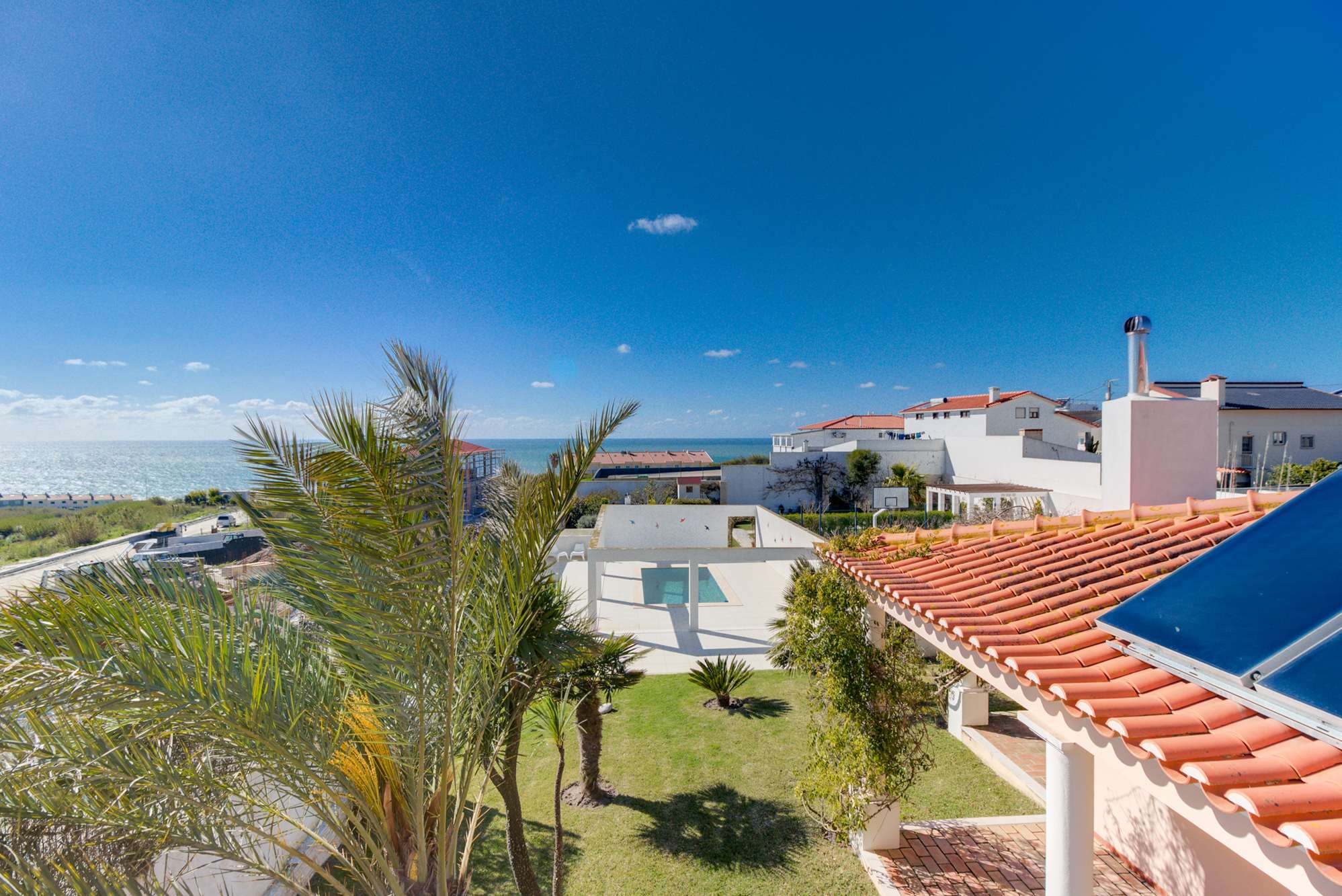 Luxury Coastal Villa with Heated Pool, Tennis Court & Ocean Views near