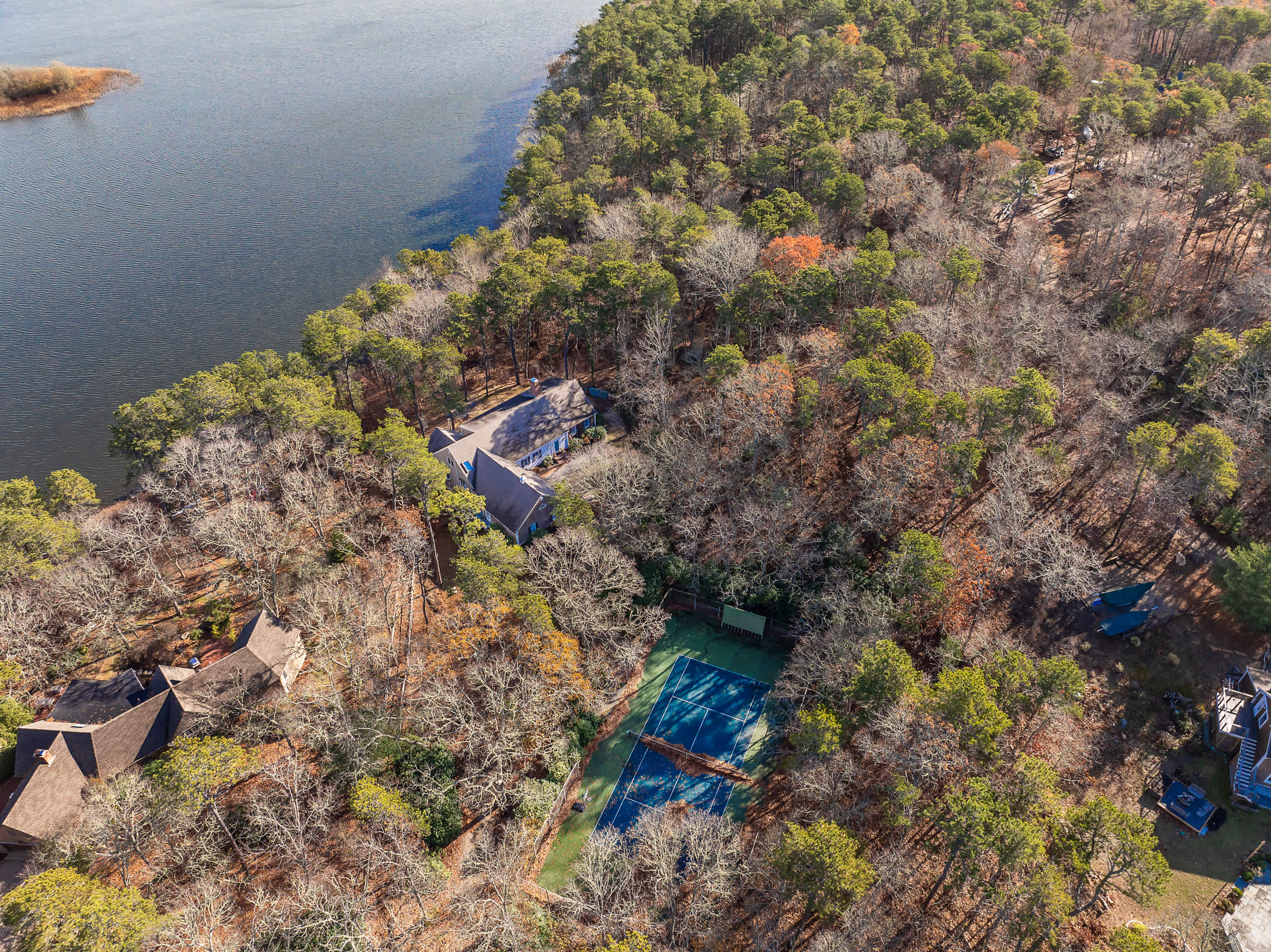 Stunning Lakefront Estate with a Private Beach Tennis Court Game Room 4