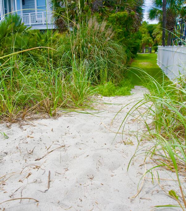 There is a dedicated neighborhood walkway situated directly between the oceanfront homes across the street. You can easily walk out of the driveway, cross the street, and use this neighborhood beach path to be on the sand in less than two minutes!