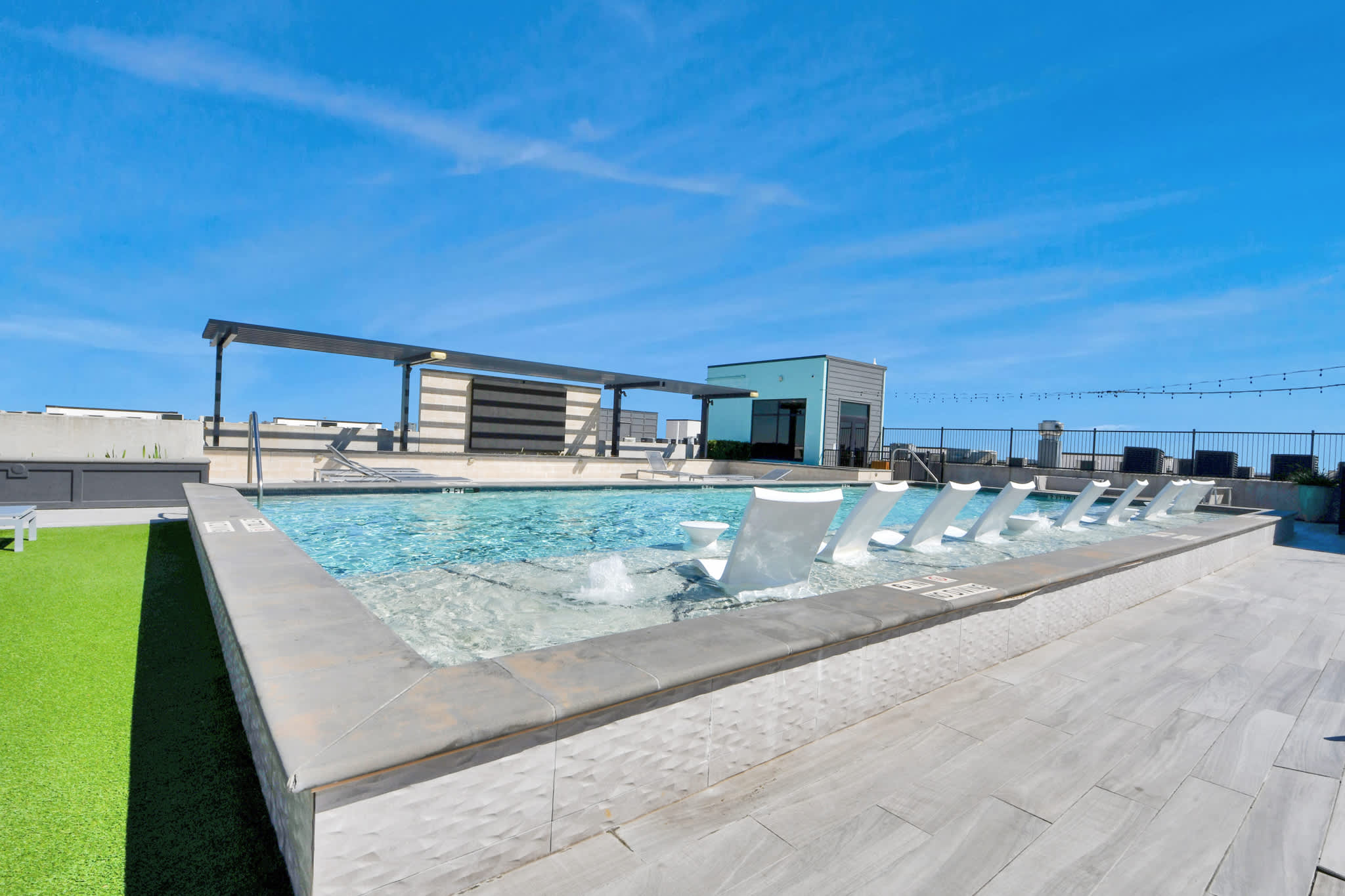 Houston Luxury Apartment Features a rooftop pool city views and king-size beds in Houston, TX