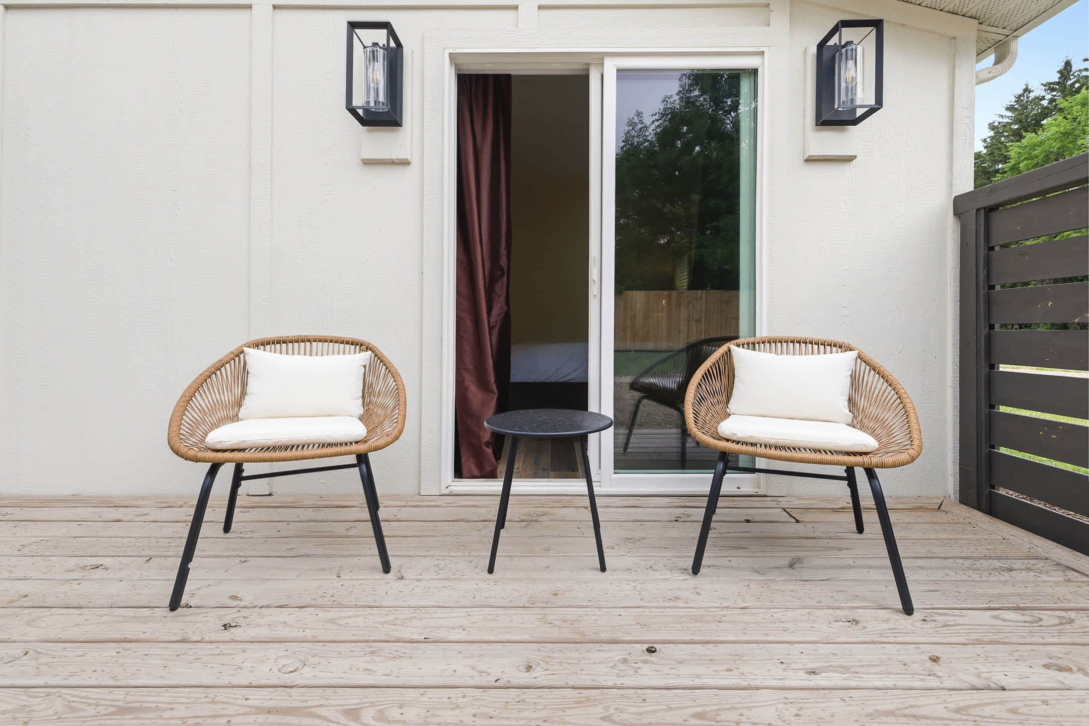 A private deck retreat for two, just outside the bedroom door.