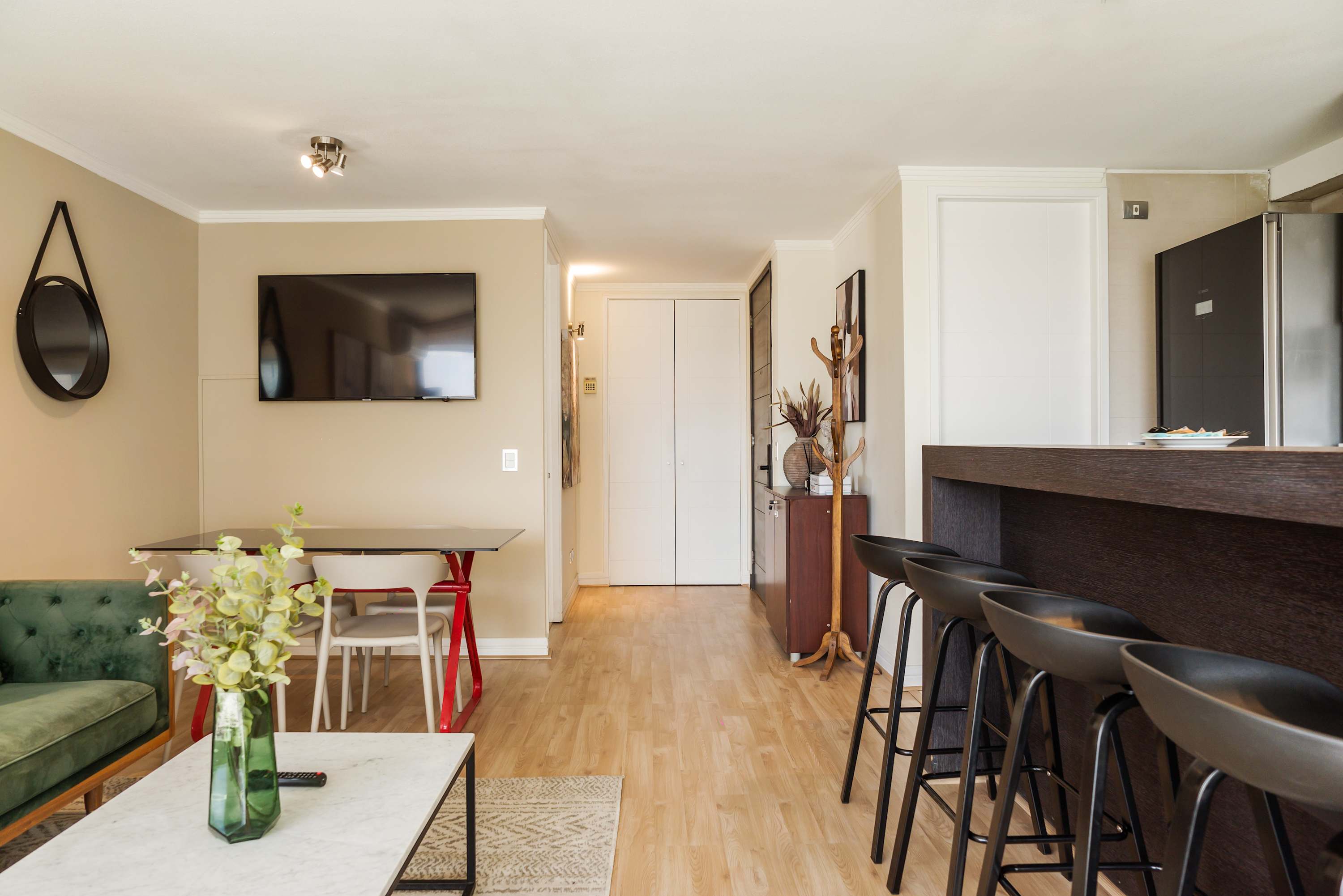 Stylish and cozy living area with modern amenities, perfect for relaxation and dining.