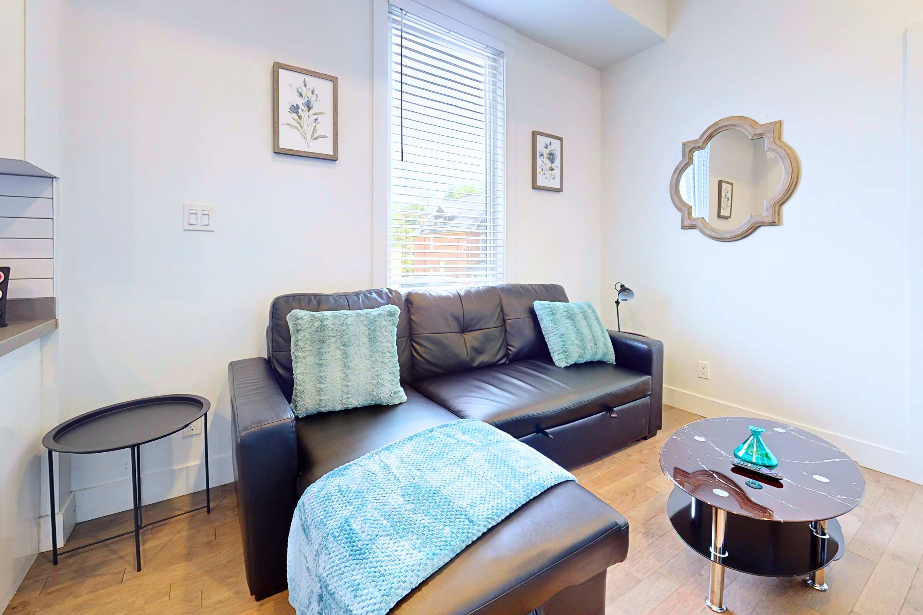 Living room with sofa bed and smart TV