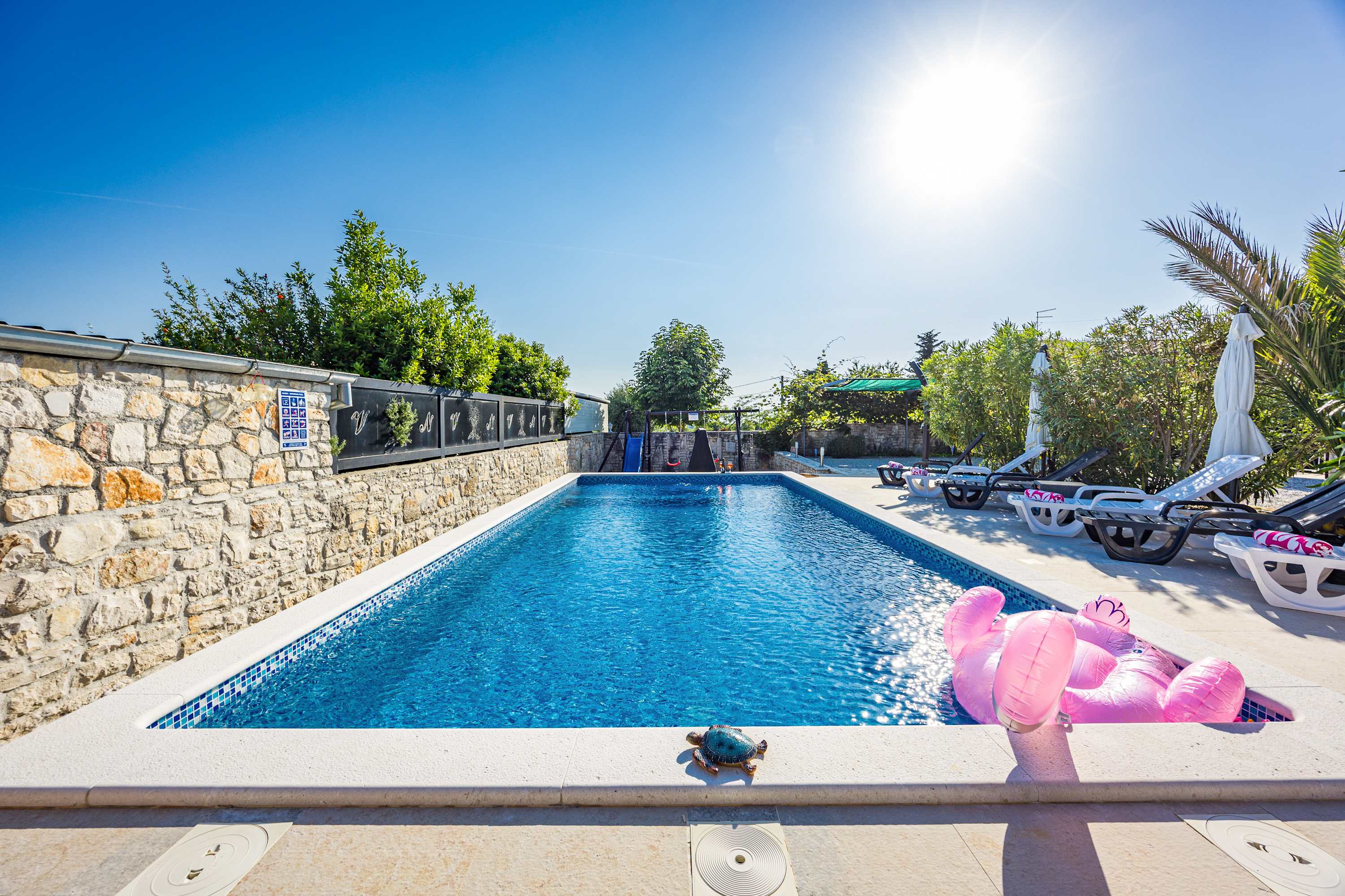 Holiday House Nives with pool and playground