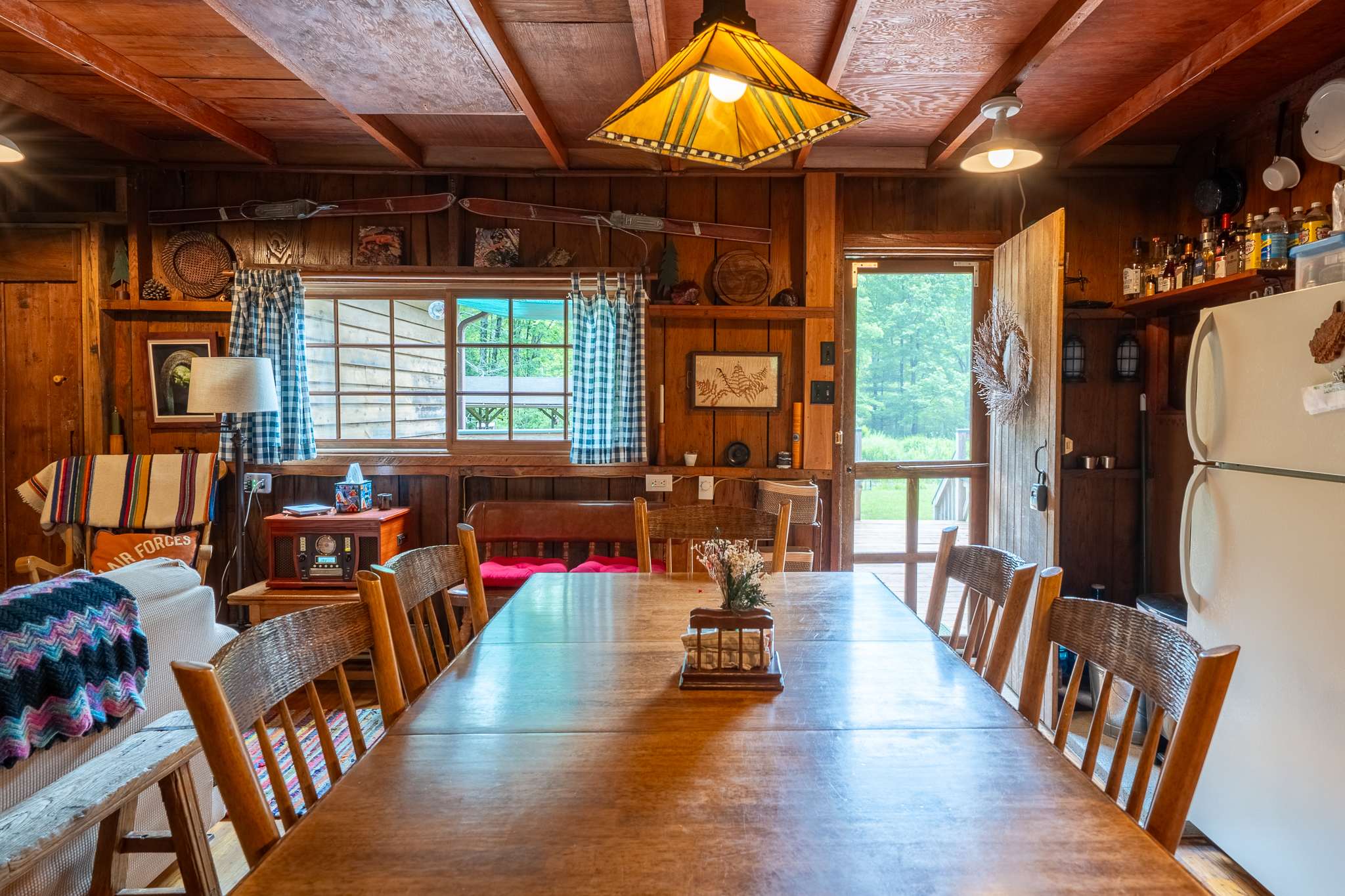 The fully equipped kitchen includes a drip coffee maker, French press, and UV-filtered spring water for easy, refreshing mornings.