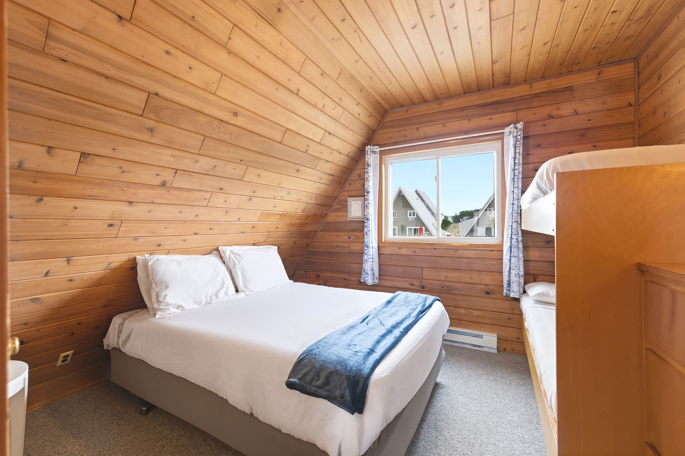 Bedroom 2 is on the 2nd floor and has a queen and a single bunk bed.